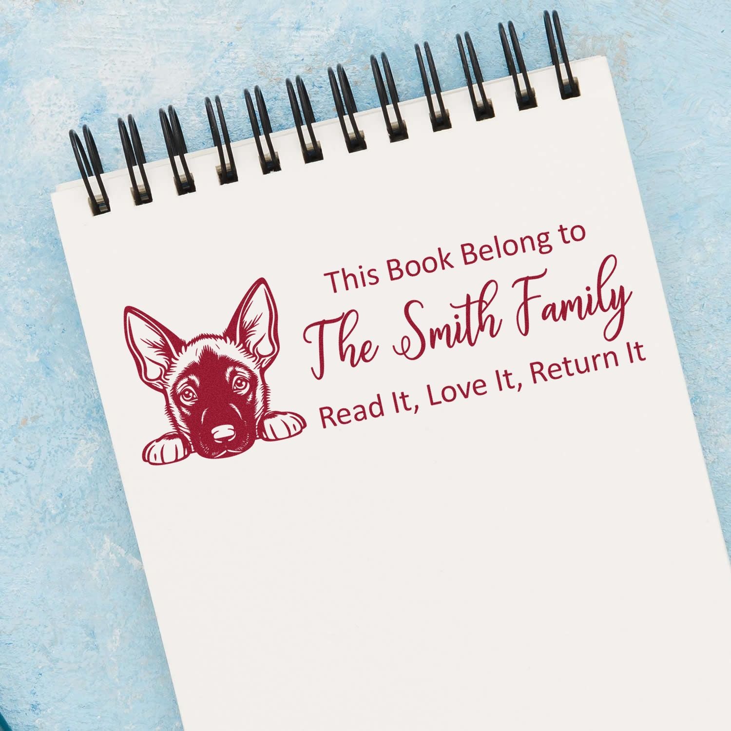 Personalized book rubber stamp with dog design for The Smith Family: Read It, Love It, Return It.