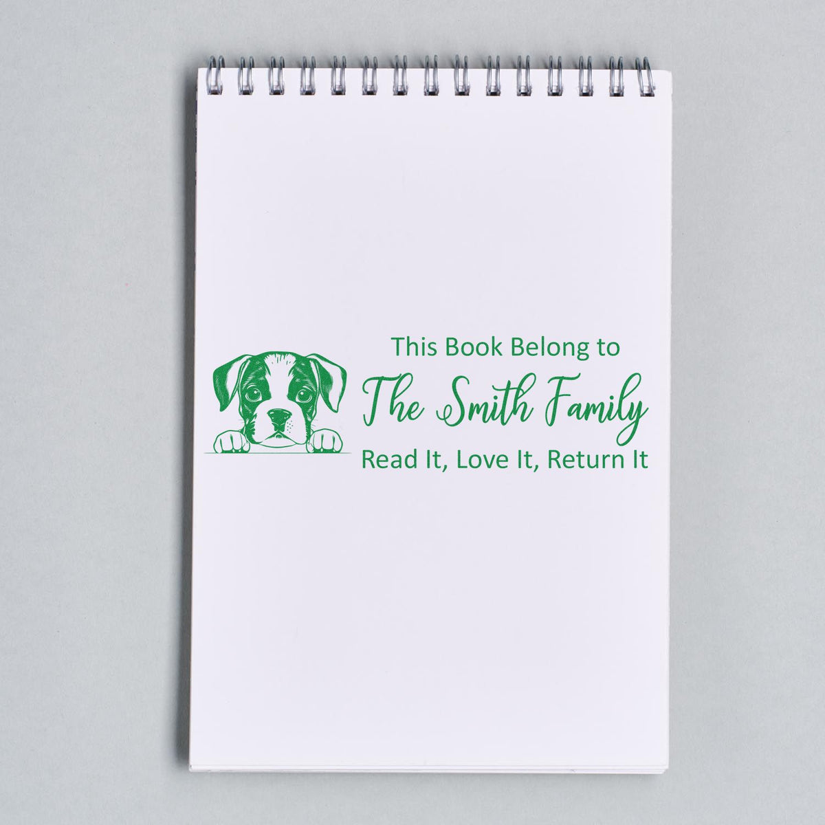 Custom rubber book stamp for The Smith Family with puppy design and Read It, Love It, Return It message.