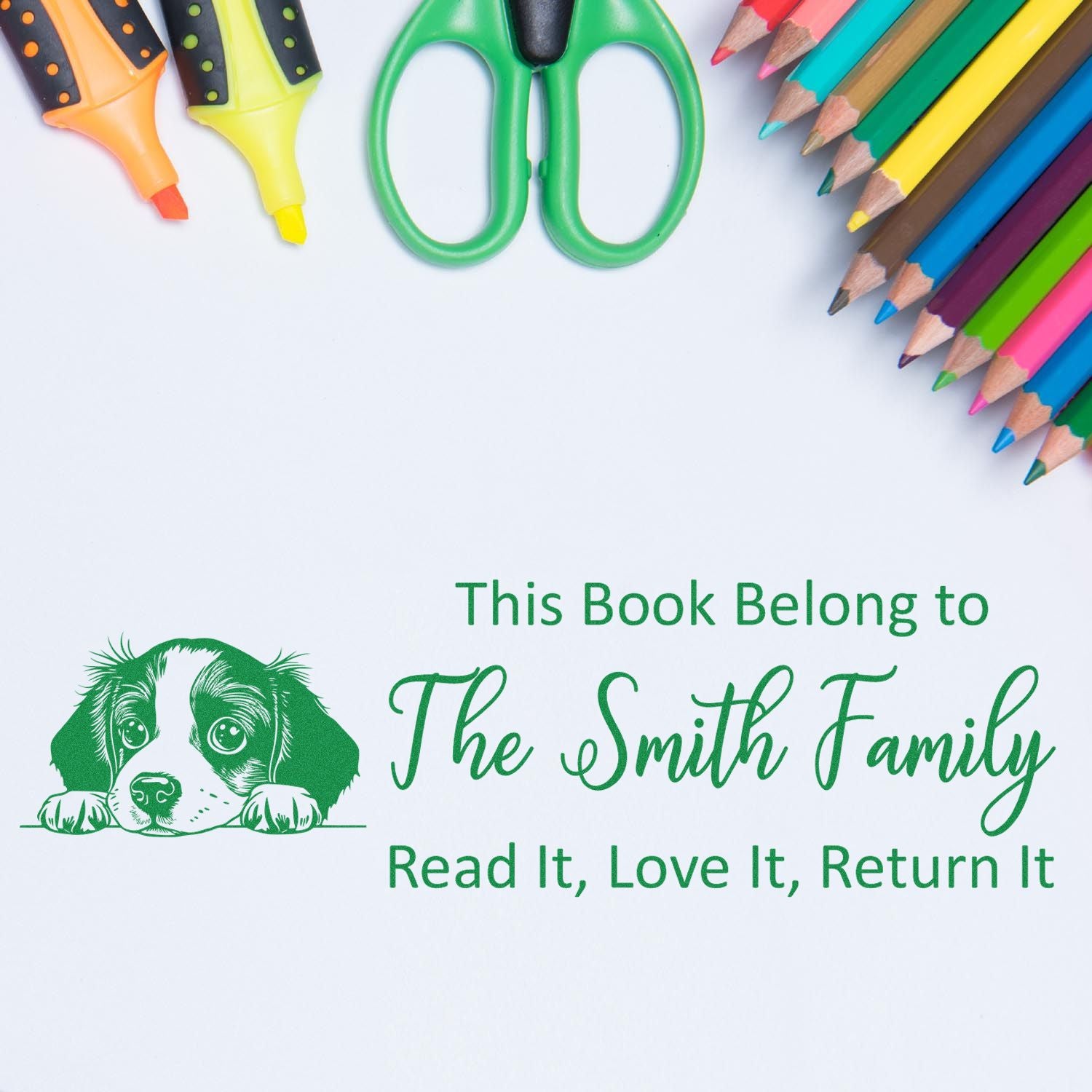 Personalized rubber book stamp with dog design for The Smith Family, ideal for labeling kids books: Read it, love it, return it.