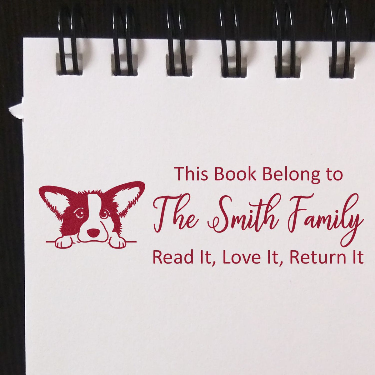 Custom rubber book stamp with corgi design for The Smith Family personal library.