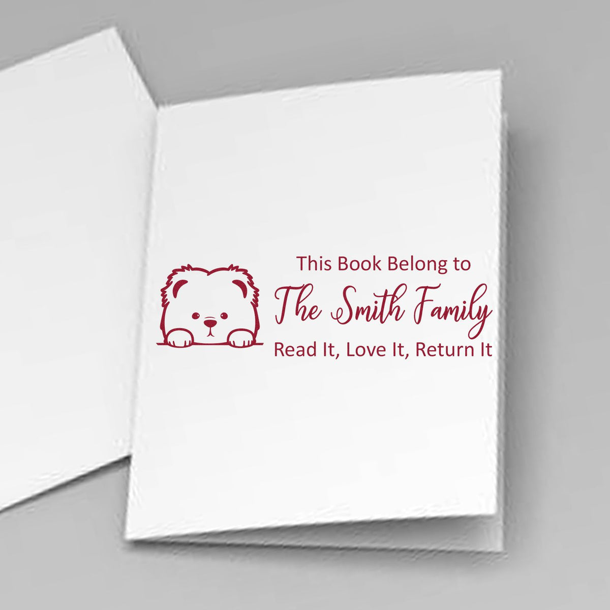 Personalized family bookplate rubber stamp for The Smith Family with bear icon and Read It, Love It, Return It.