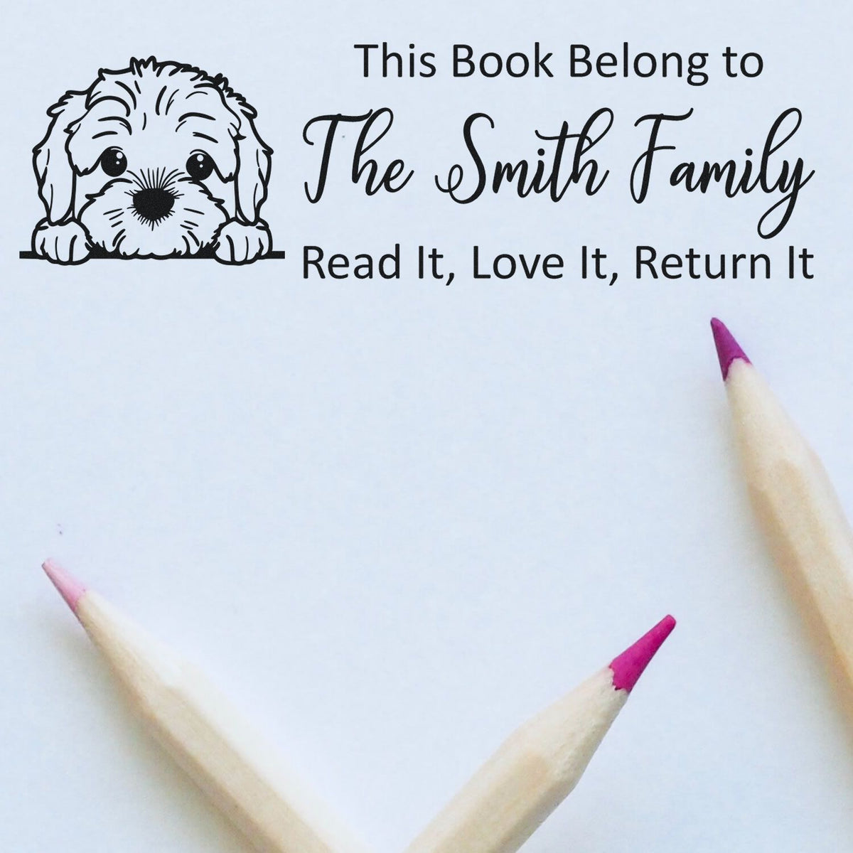 Personalized book stamp with puppy design, family name, and Read It, Love It, Return It text for custom bookplates.
