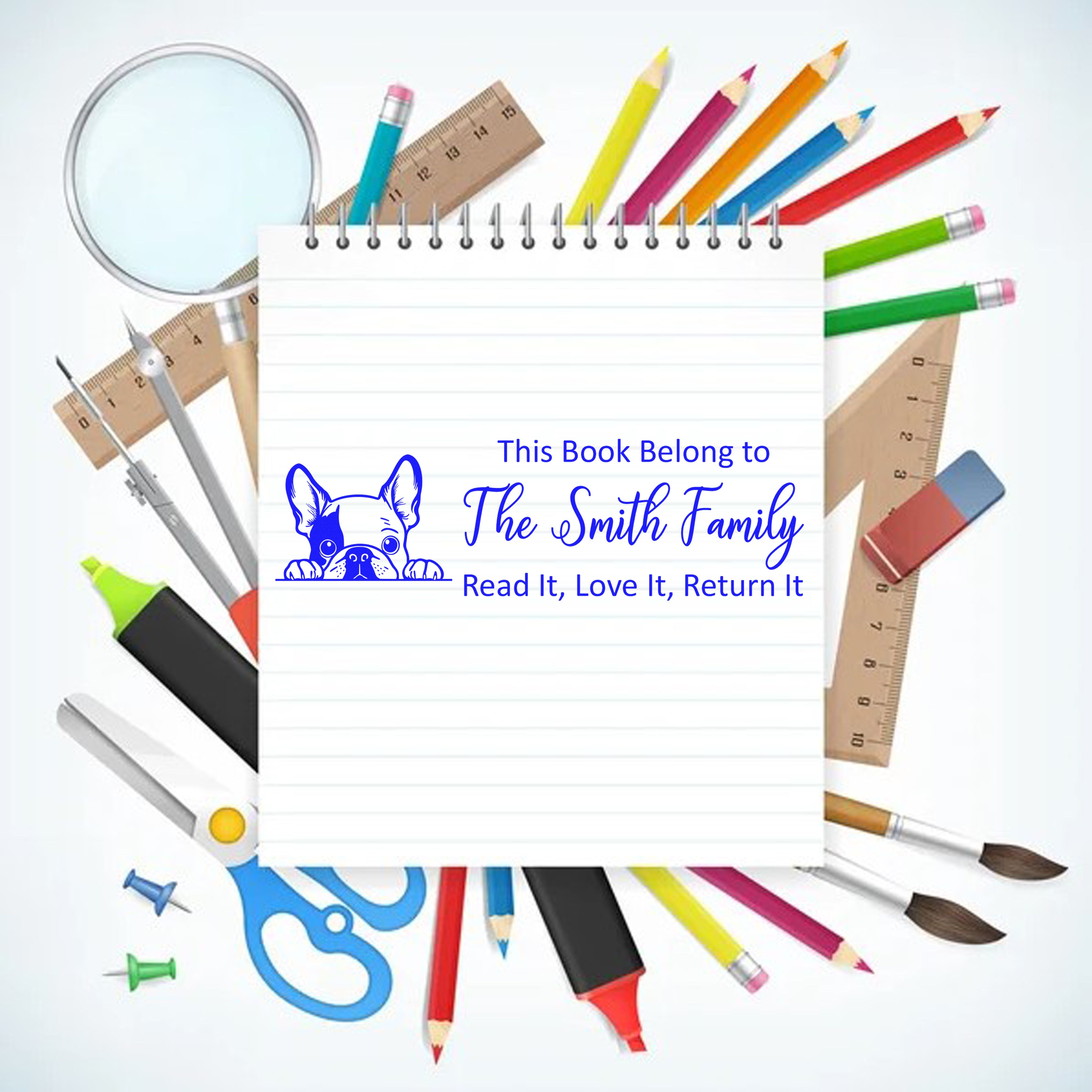 Personalized rubber book stamp with dog logo and This Book Belongs to The Smith Family for labeling and returning books.