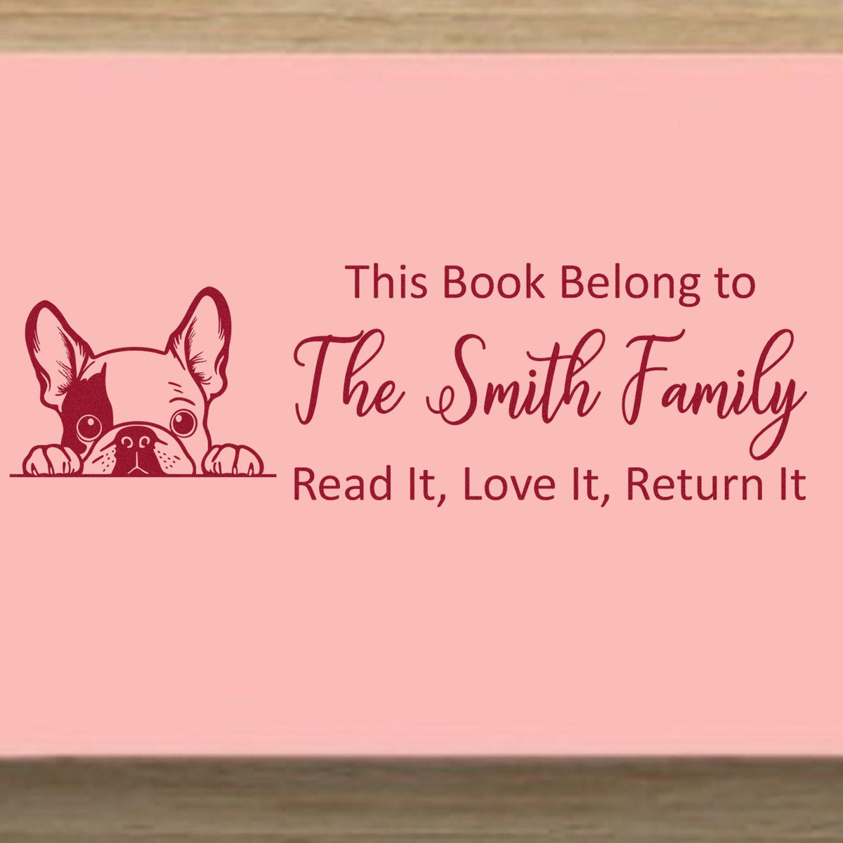 Custom book stamp with French bulldog and personalized This Book Belong to The Smith Family return-it message.