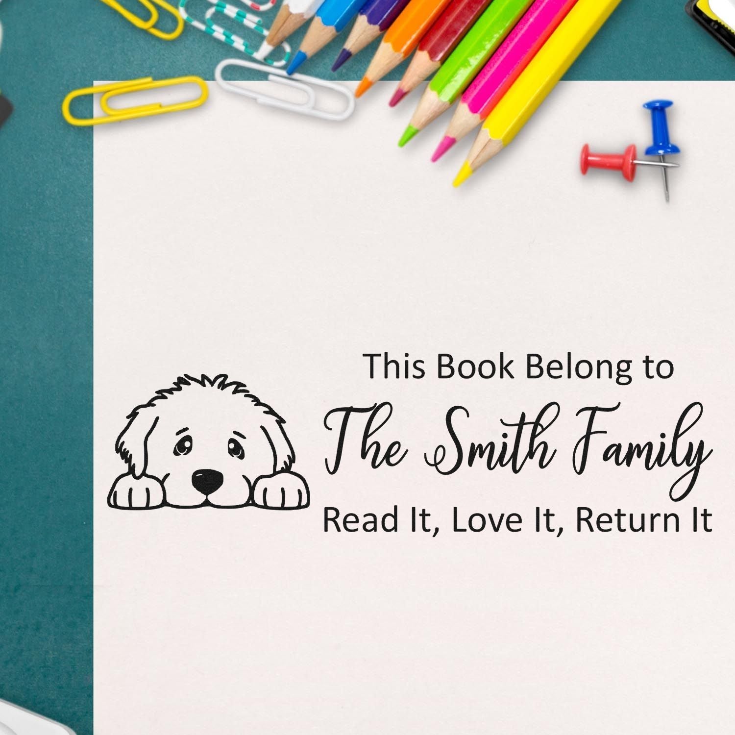 Personalized rubber book stamp with puppy design: This Book Belongs to The Smith Family, Read It, Love It, Return It.