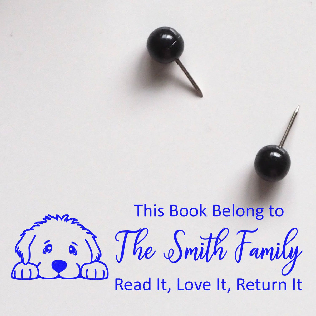 Personalized rubber book stamp with dog design for family books: This Book Belongs to The Smith Family, Read It, Love It, Return It.