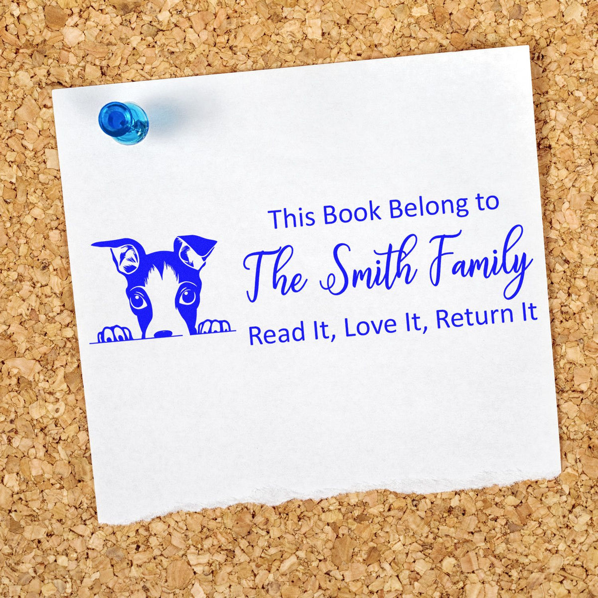 Custom rubber book stamp with dog graphic and family name for personal library books: read it, love it, return it.