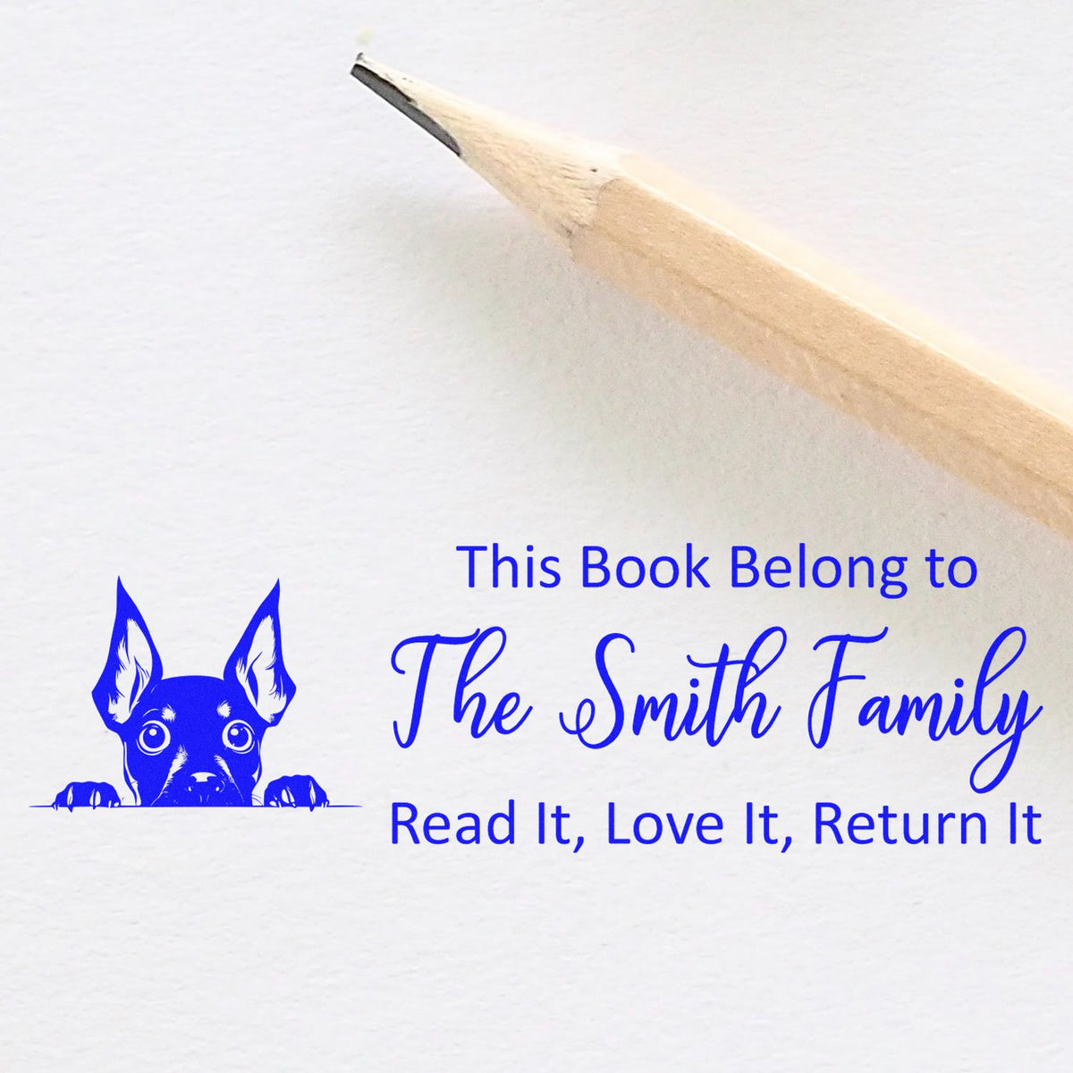 Custom book stamp with dog logo, personalized for The Smith Family: This Book Belongs to The Smith Family, Read It, Love It, Return It.
