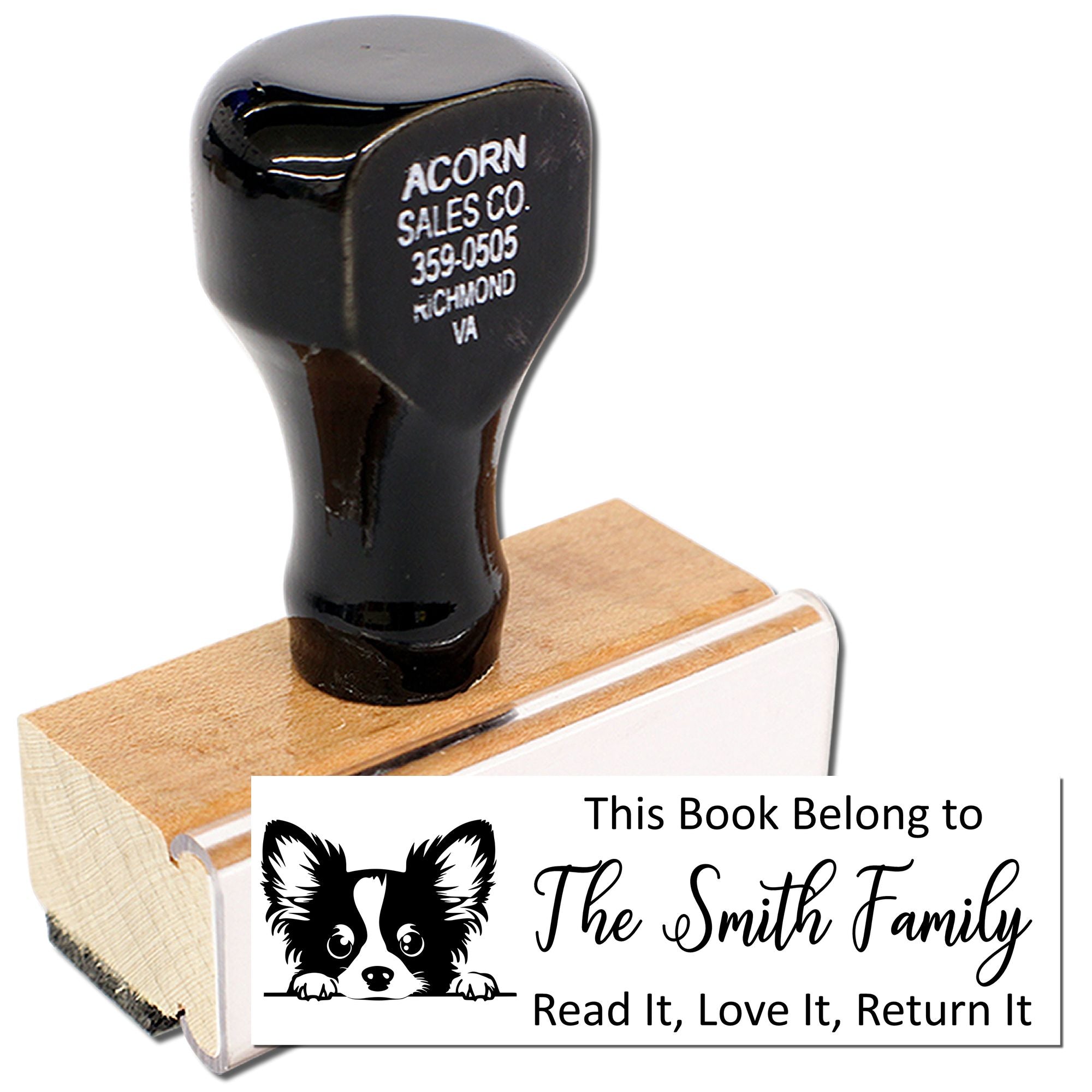 Custom rubber book stamp with dog design and family ownership text: This Book Belongs to The Smith Family, Read It, Love It, Return It.
