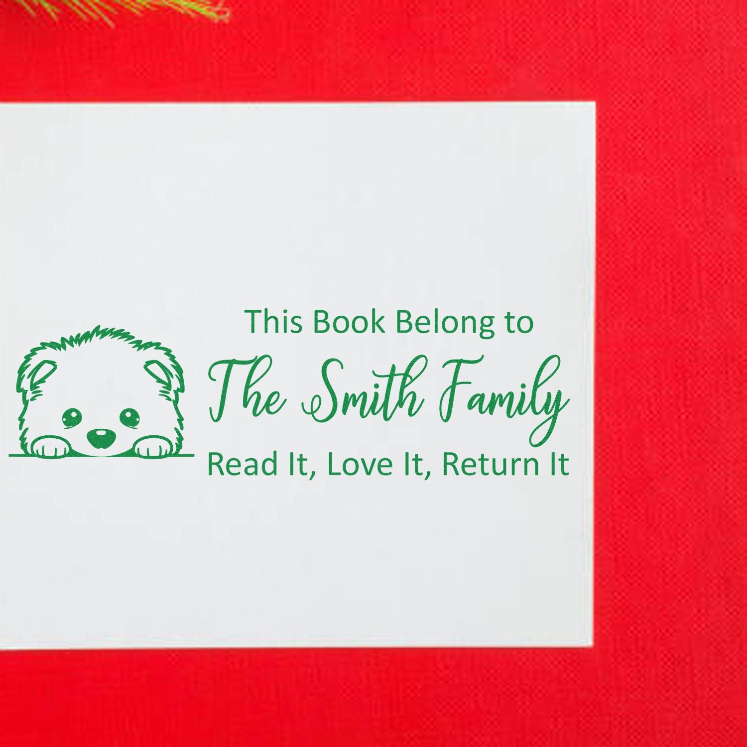 Personalized rubber book stamp with puppy icon for library books: This Book Belongs to The Smith FamilyRead It, Love It, Return It.