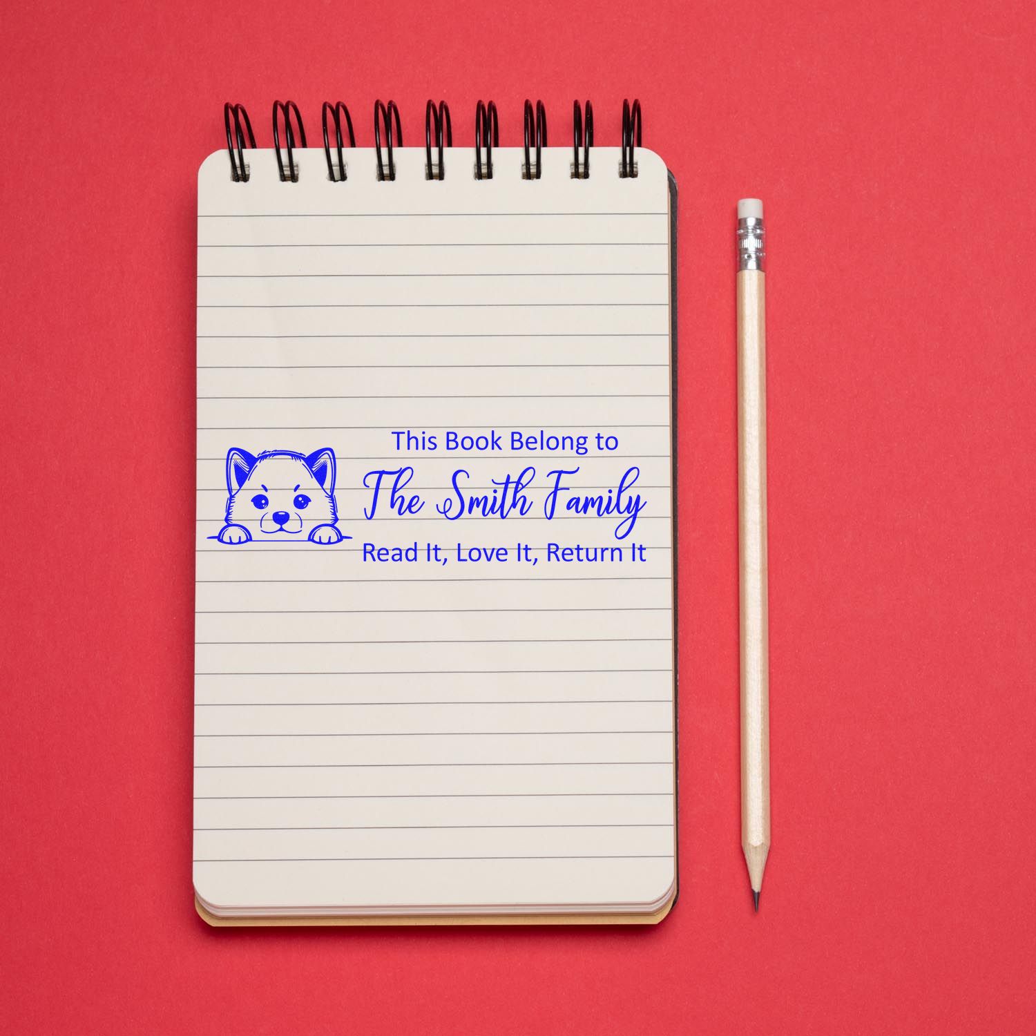 Personalized rubber book stamp for The Smith Family with cat design and Read It, Love It, Return It library label