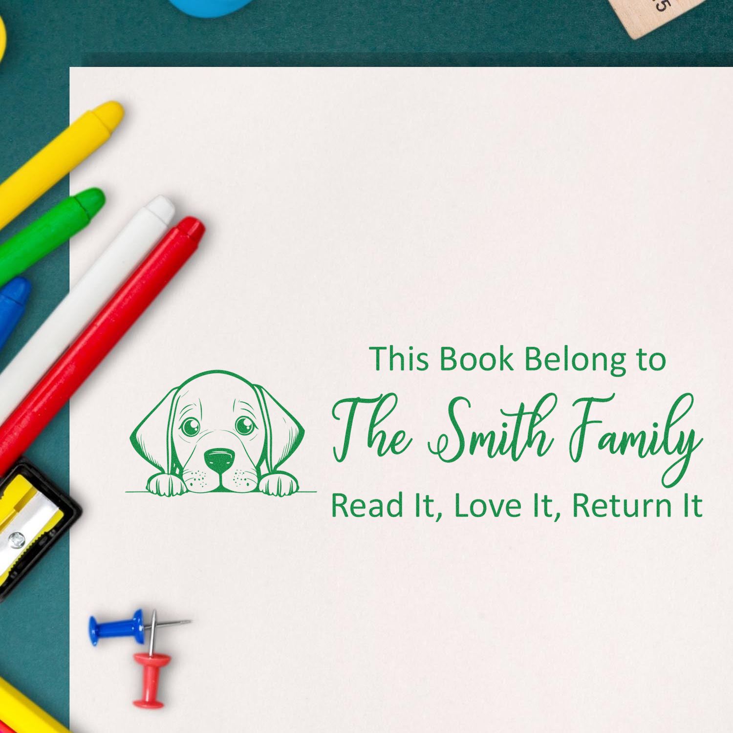 Custom dog book stamp for The Smith Family, marked Read It, Love It, Return It for personalized library books.