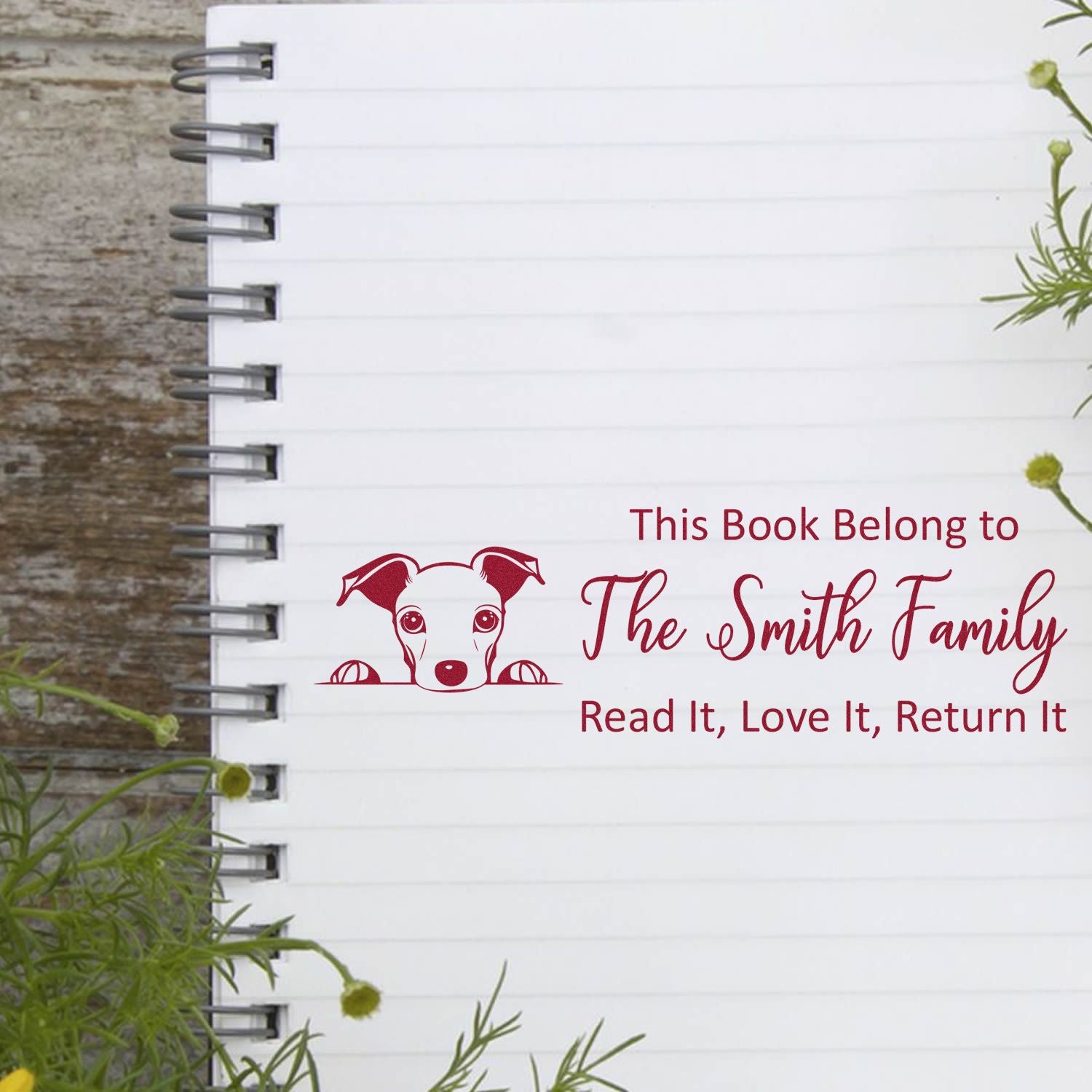 Personalized rubber stamp for books, featuring a dog bookplate and family name: This Book Belongs to The Smith Family.