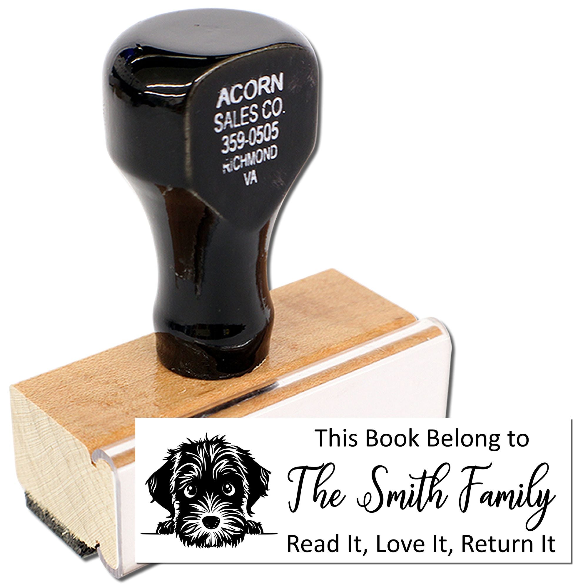 Personalized book return rubber stamp with dog design and custom This Book Belongs to family name imprint.