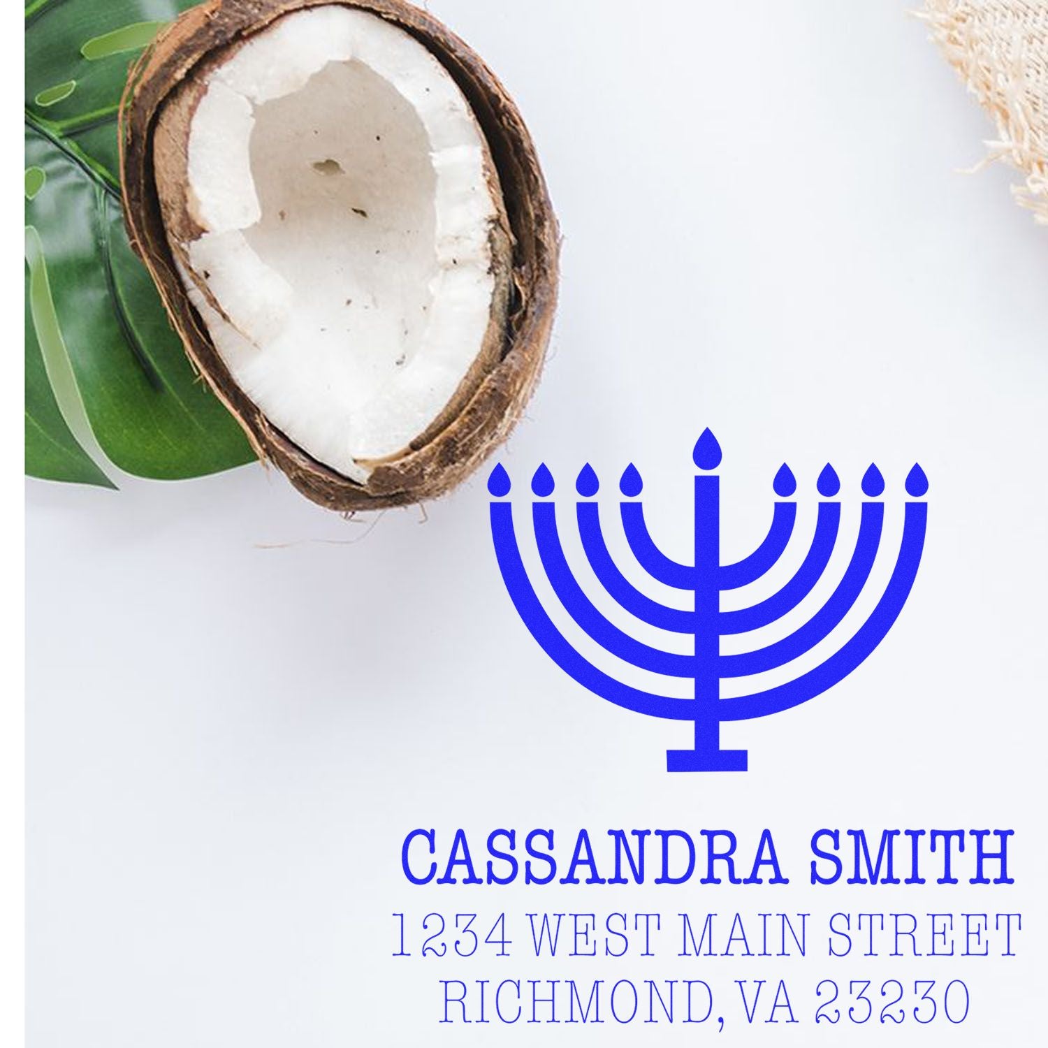 Custom Hanukkah rubber stamp with blue menorah and return address for Cassandra Smith in Richmond, Virginia.