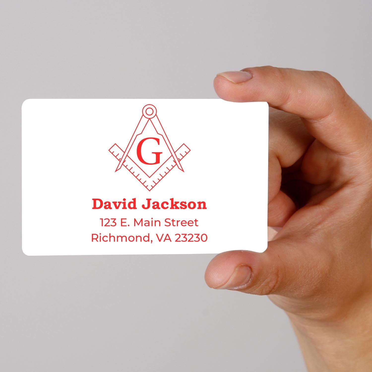 Custom rubber stamp design with Masonic logo, name, and address for David Jackson business branding.