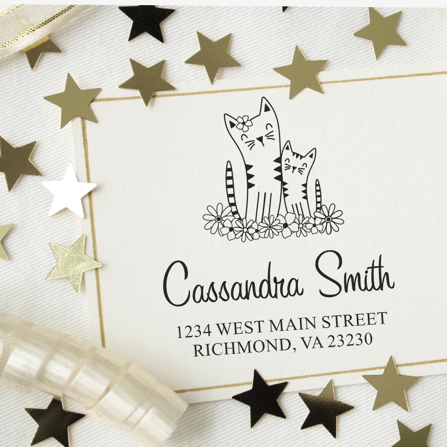 Custom cat return address rubber stamp with name Cassandra Smith and Richmond, VA address.