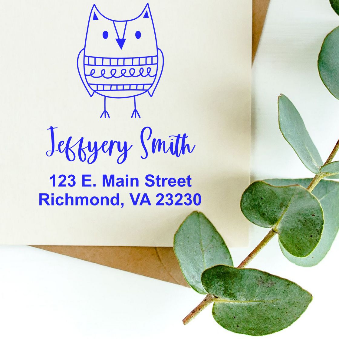 Personalized owl return address rubber stamp with Jeffery Smiths Richmond, VA address on an envelope