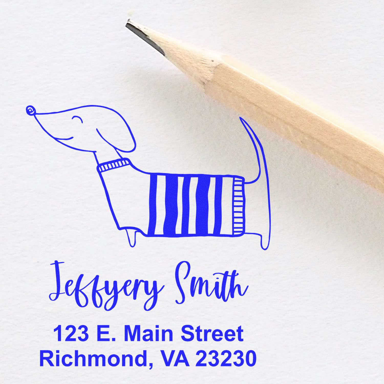 Personalized rubber address stamp with dog logo, Jefferson Smith name, and Richmond, VA return address.