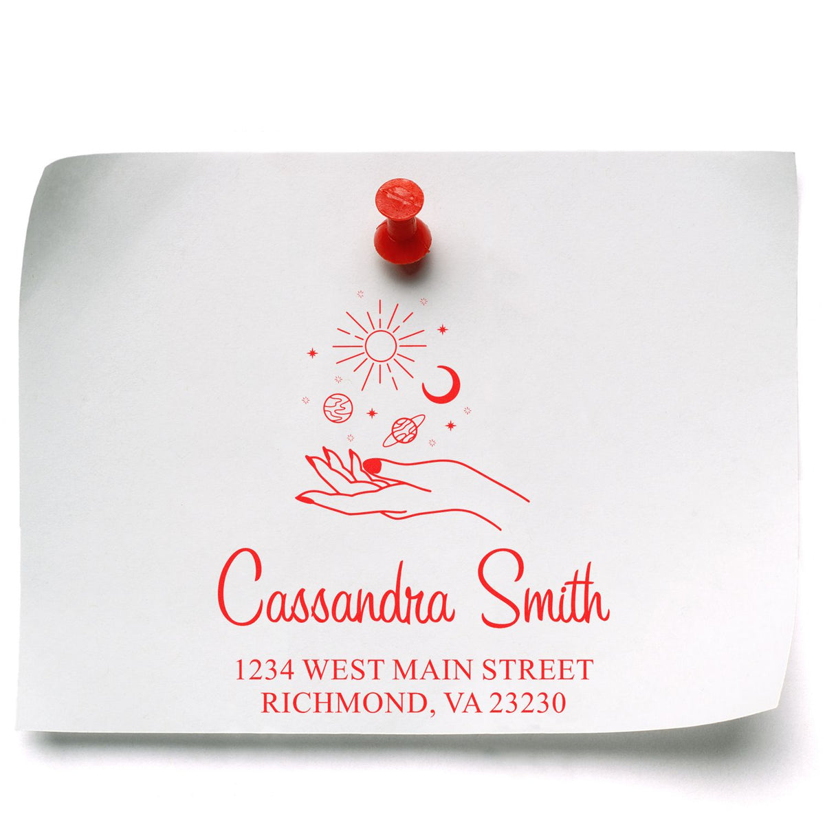 Personalized return address rubber stamp with celestial hand design and name imprint on envelope