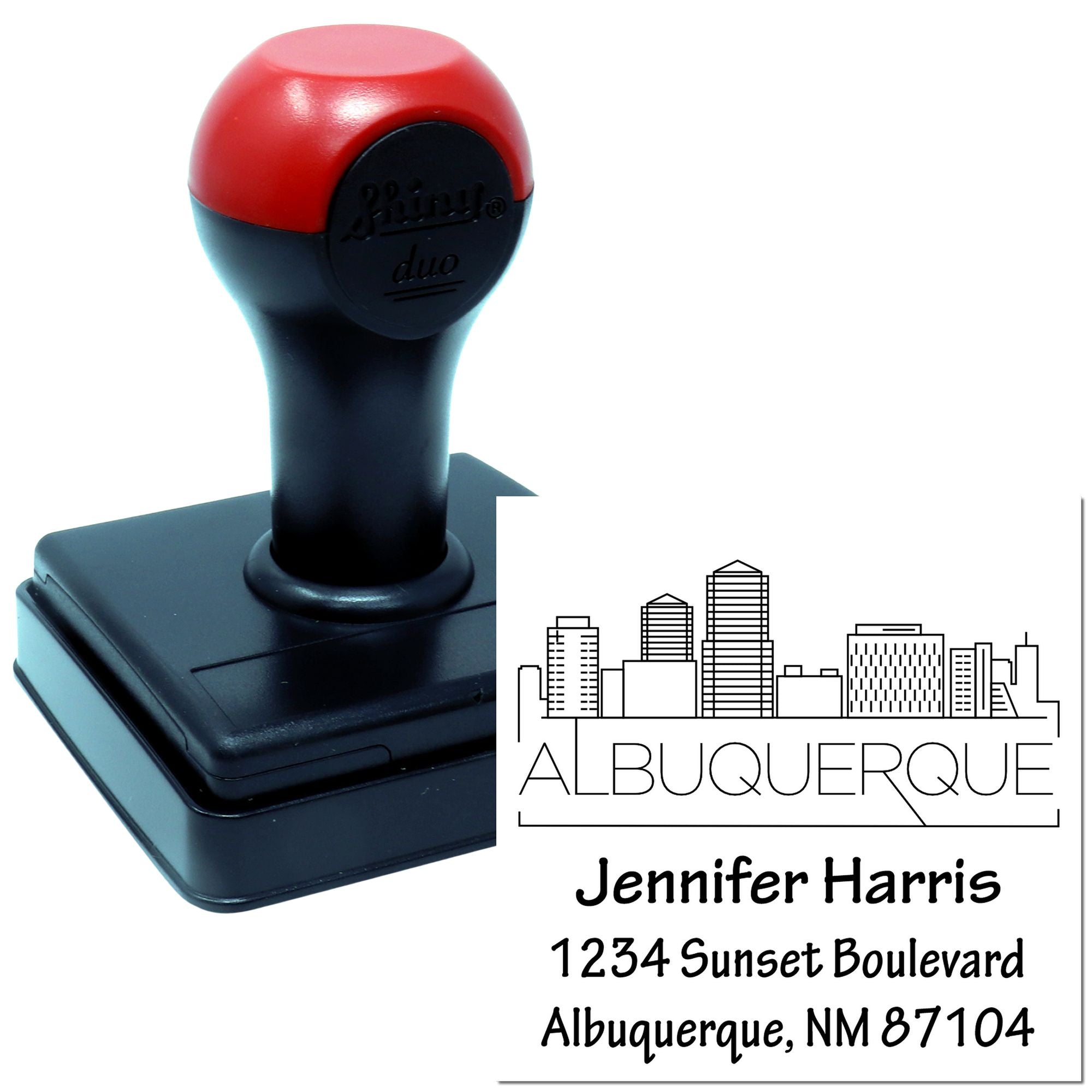 Custom self-inking rubber address stamp with Albuquerque skyline design, name Jennifer Harris, and 1234 Sunset Boulevard return address.