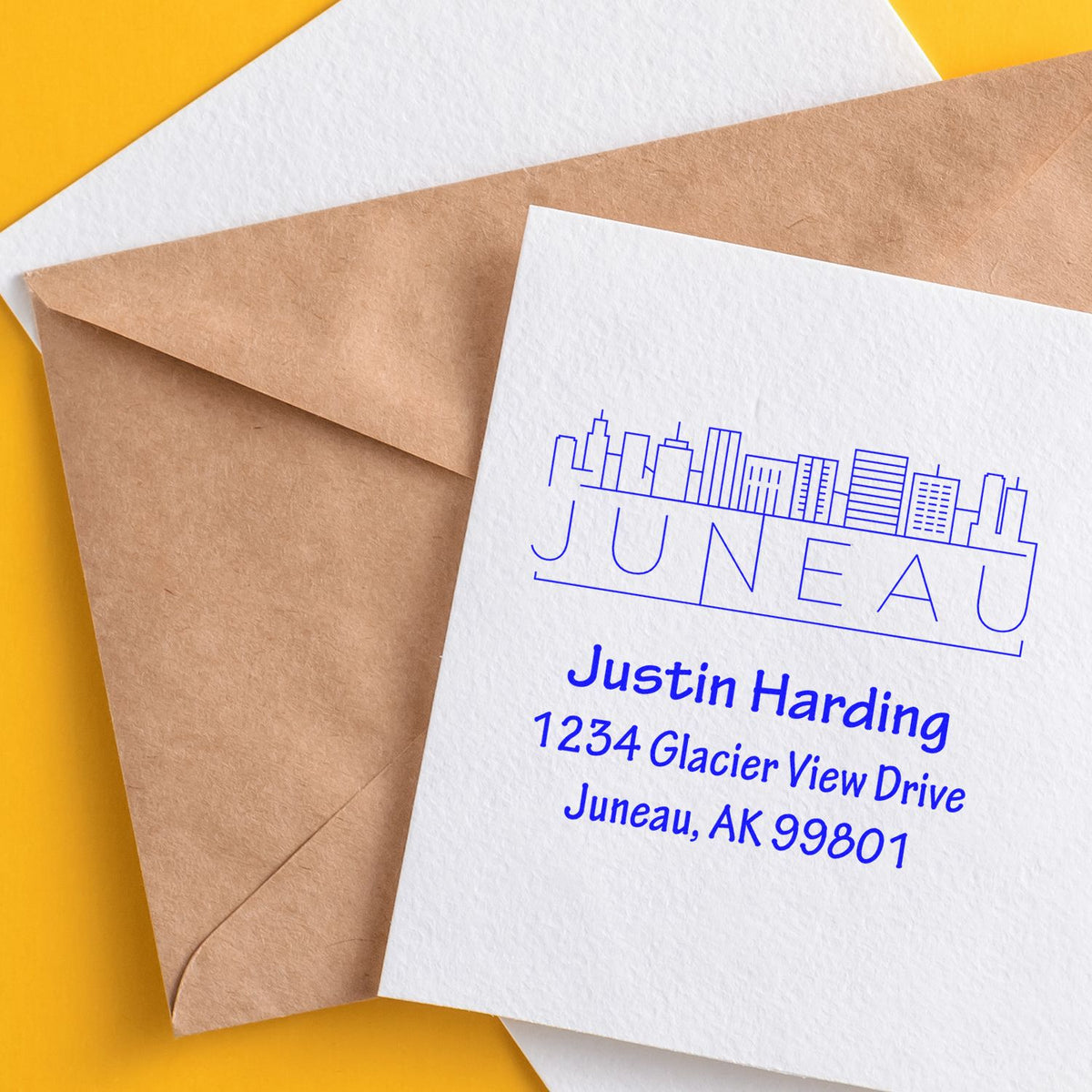 Personalized return address rubber stamp on envelope with Juneau, AK address for business or home mailings.