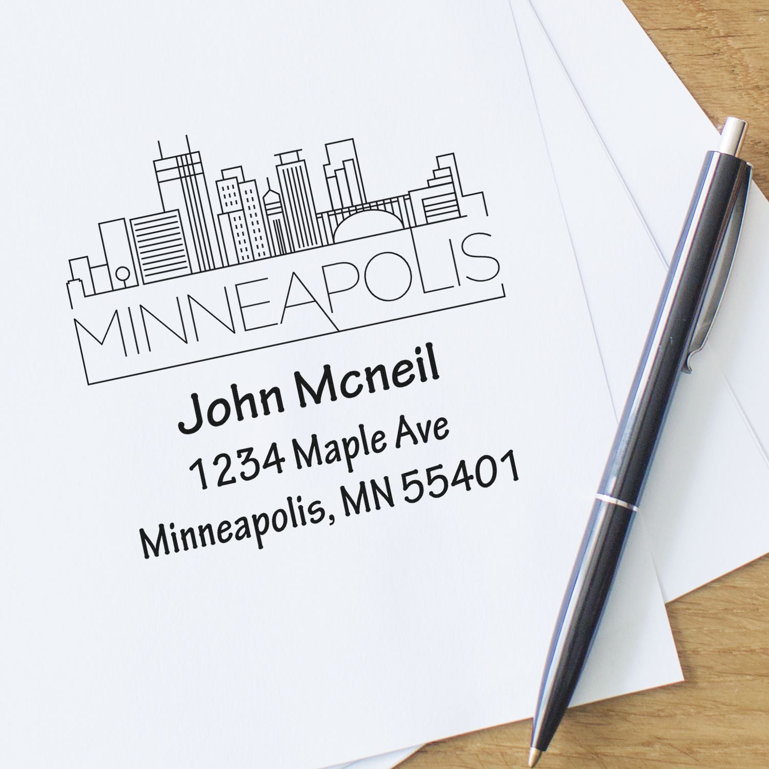 Custom Minneapolis return address rubber stamp with skyline design for personalized envelopes and stationery.