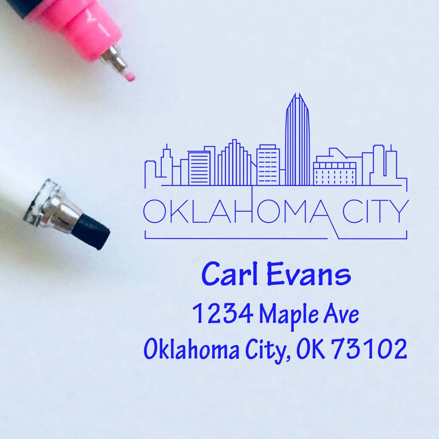 Custom Oklahoma City return address rubber stamp with skyline design, Carl Evans, 1234 Maple Ave, OK 73102.