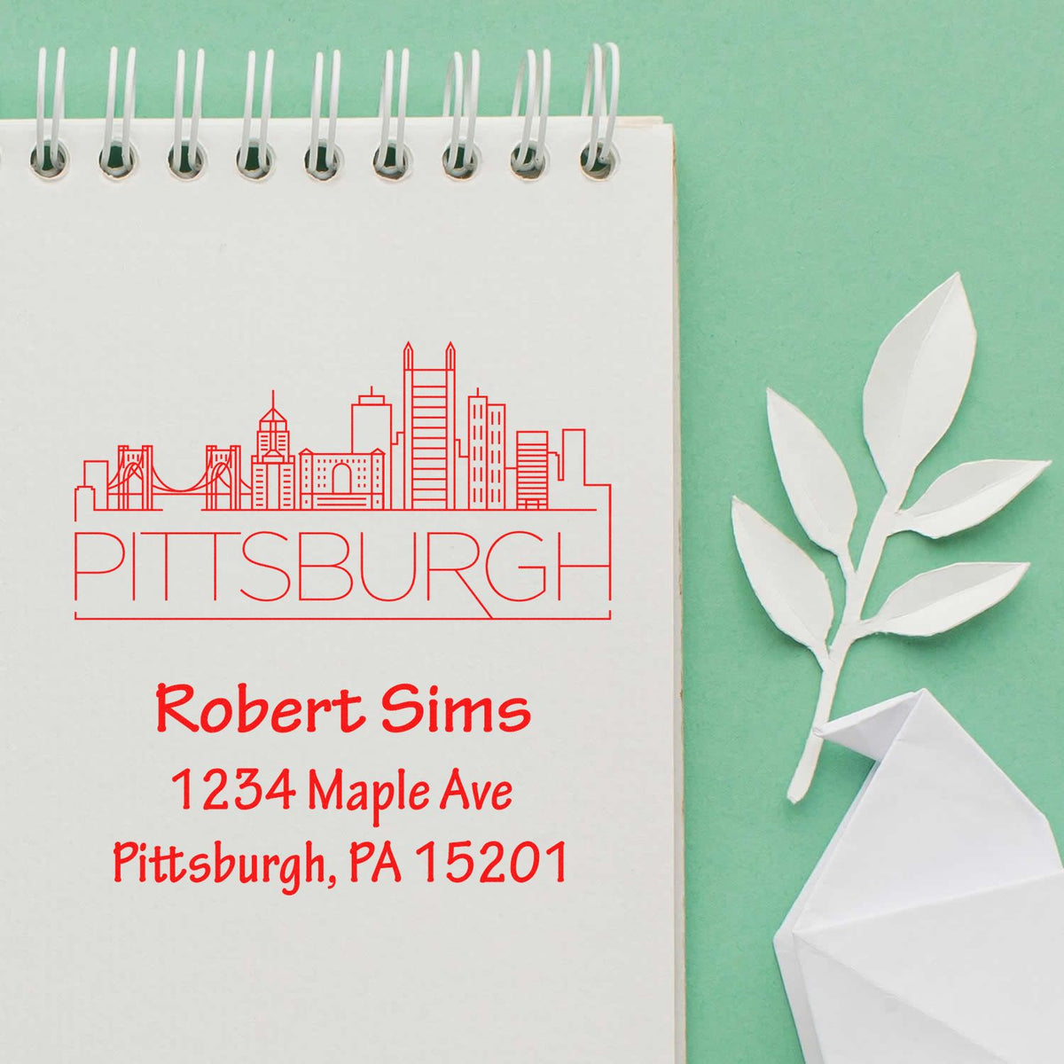 Custom Pittsburgh address rubber stamp with skyline, Robert Sims name, and mailing address for personalized stationery.