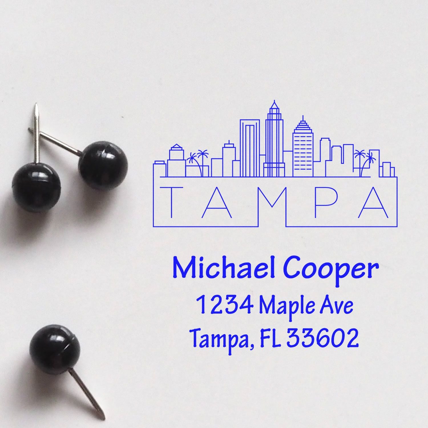 Personalized Tampa skyline return address rubber stamp for Michael Cooper, 1234 Maple Ave, Tampa, FL 33602.