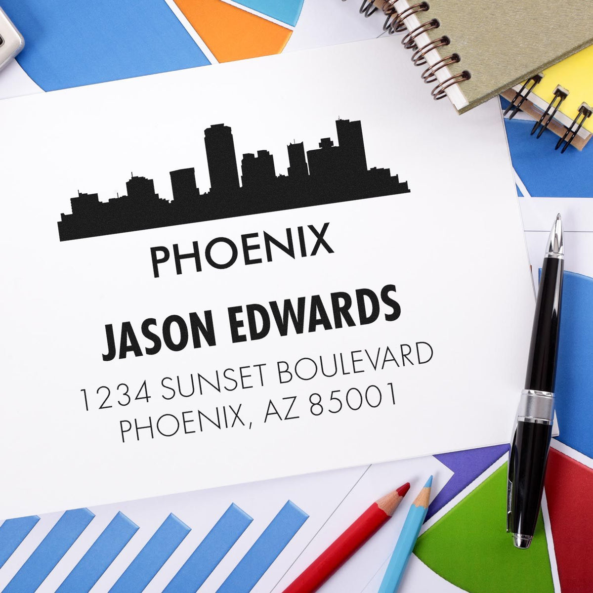 Custom Phoenix address rubber stamp with skyline logo, Jason Edwards name, and return mailing address for business stationery.