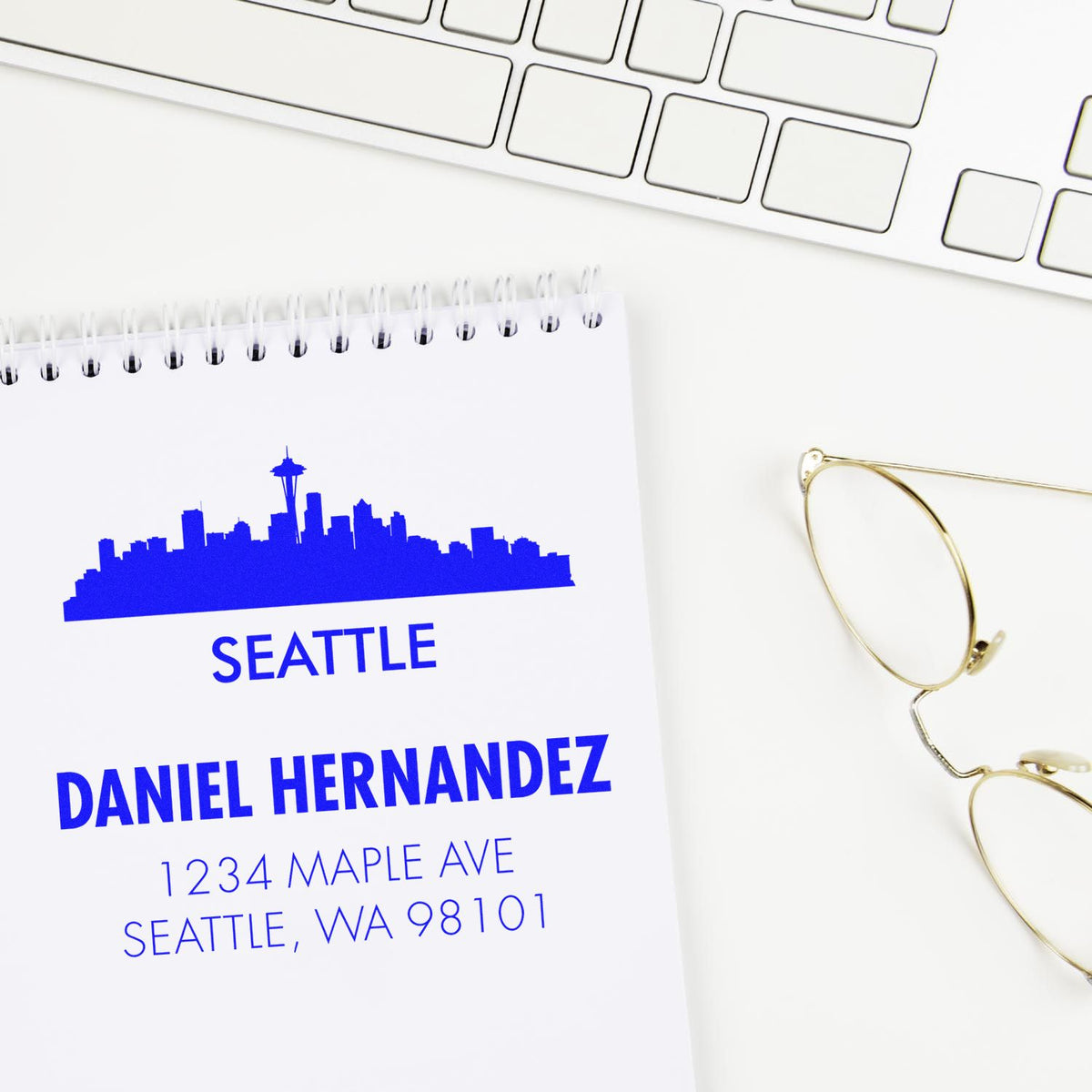 Custom Seattle address rubber stamp impression with skyline, featuring Daniel Hernandez and 1234 Maple Ave.