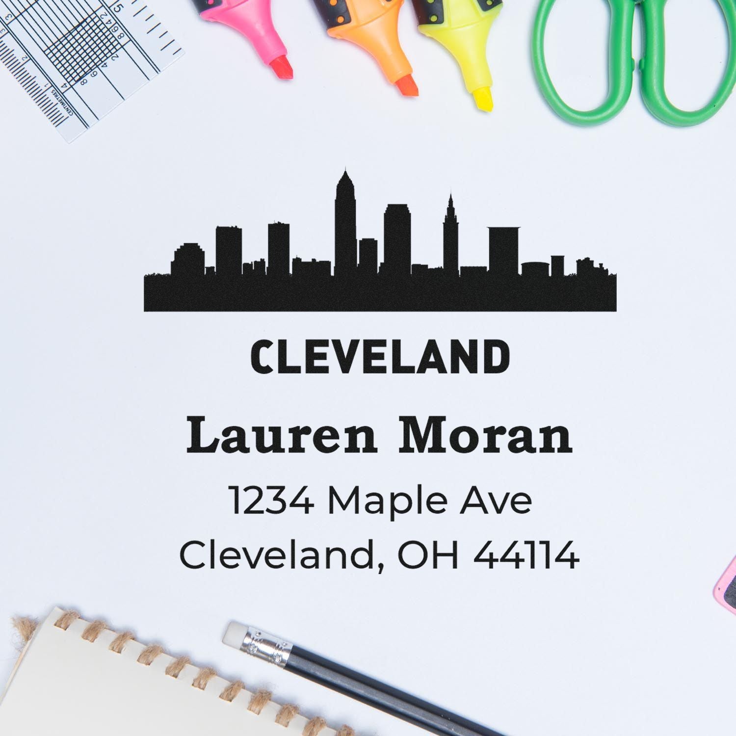 Custom Cleveland address rubber stamp with skyline, name, street address, and ZIP code for personalized mailings.