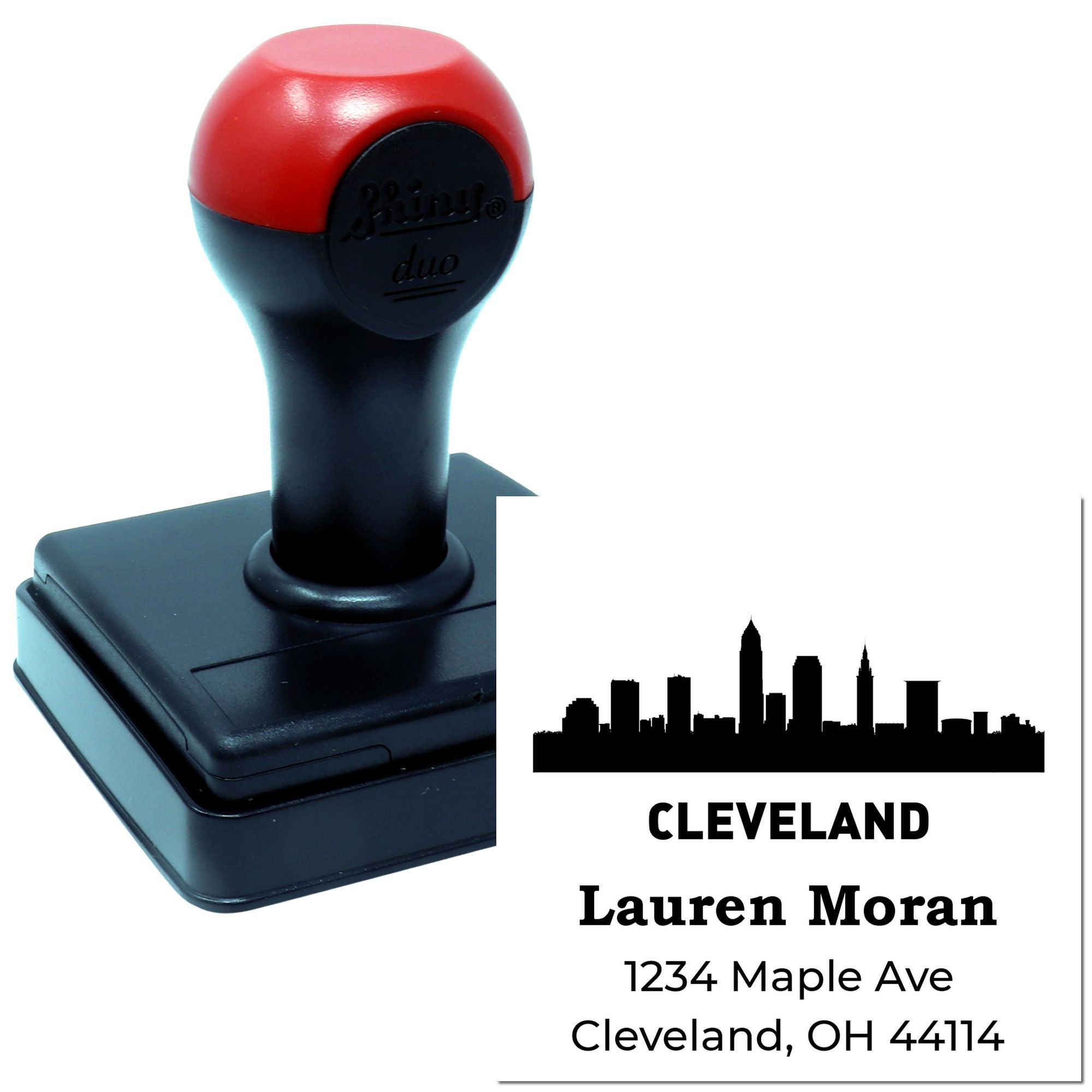 Custom self-inking rubber stamp with Cleveland skyline return address design for personalized name and mailing label.