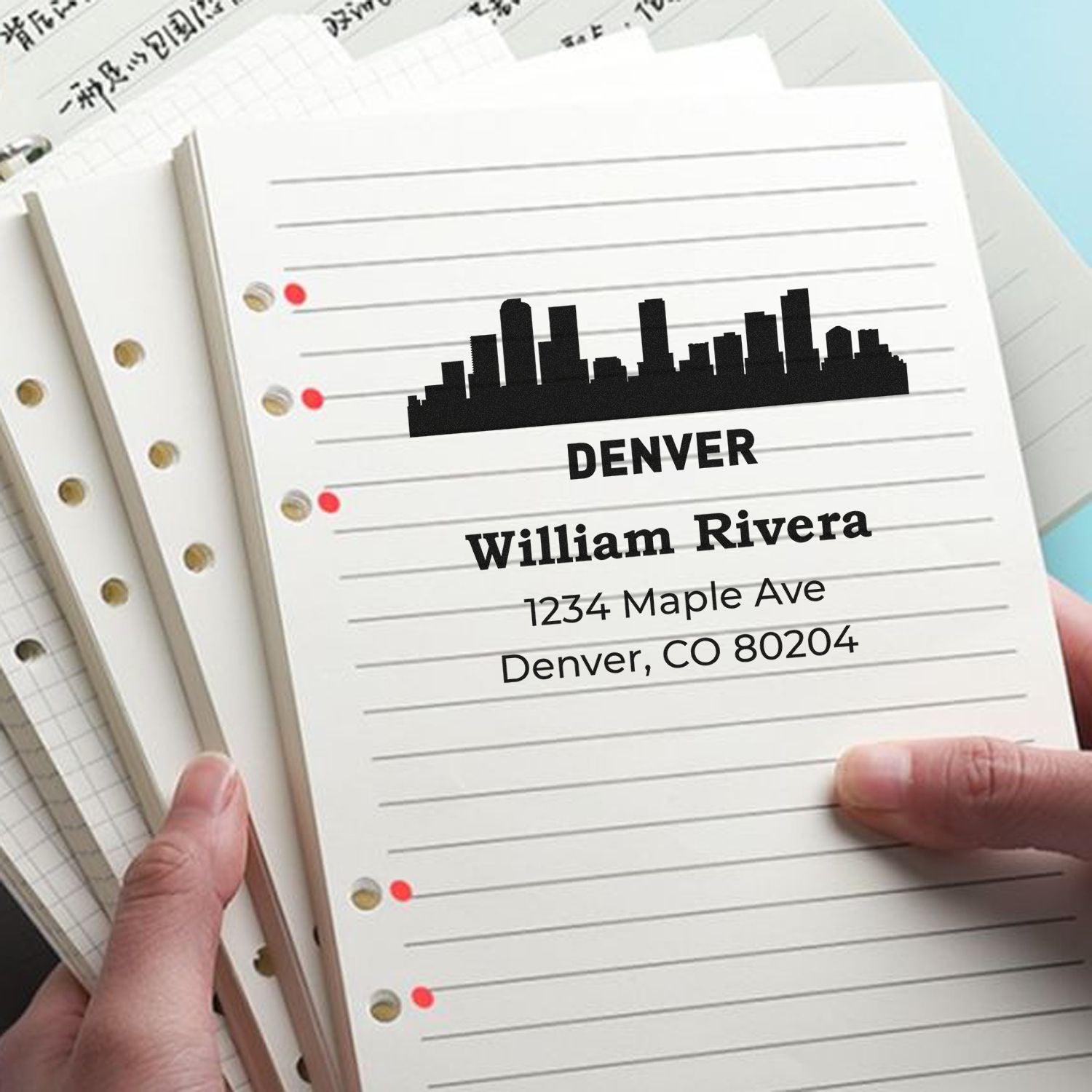 Custom Denver rubber stamp with skyline, name and return address for personalized mailing and stationery.