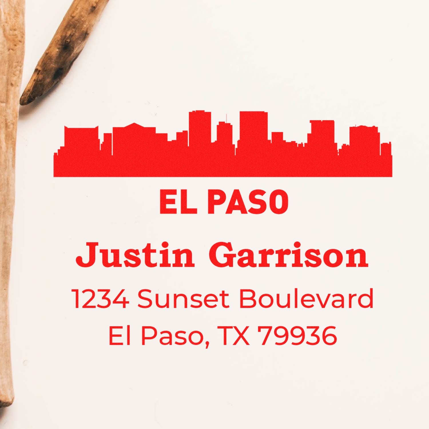 Custom rubber address stamp with El Paso skyline, Justin Garrison name, and full return address in El Paso, TX 79936