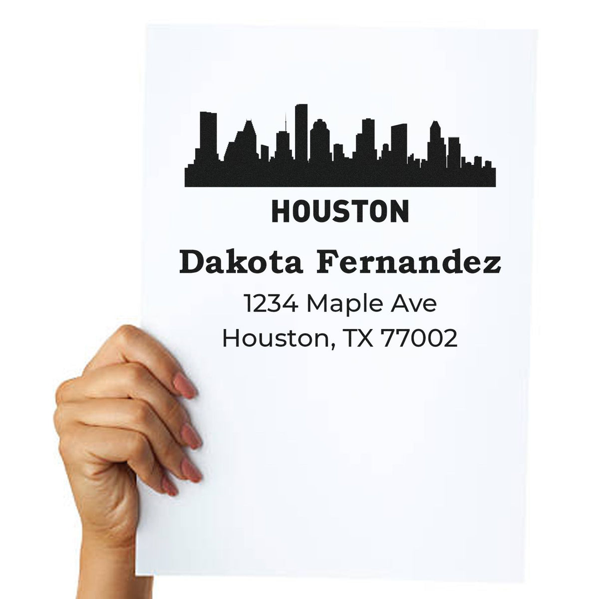 Personalized Houston return address rubber stamp with skyline, name, and address on paper