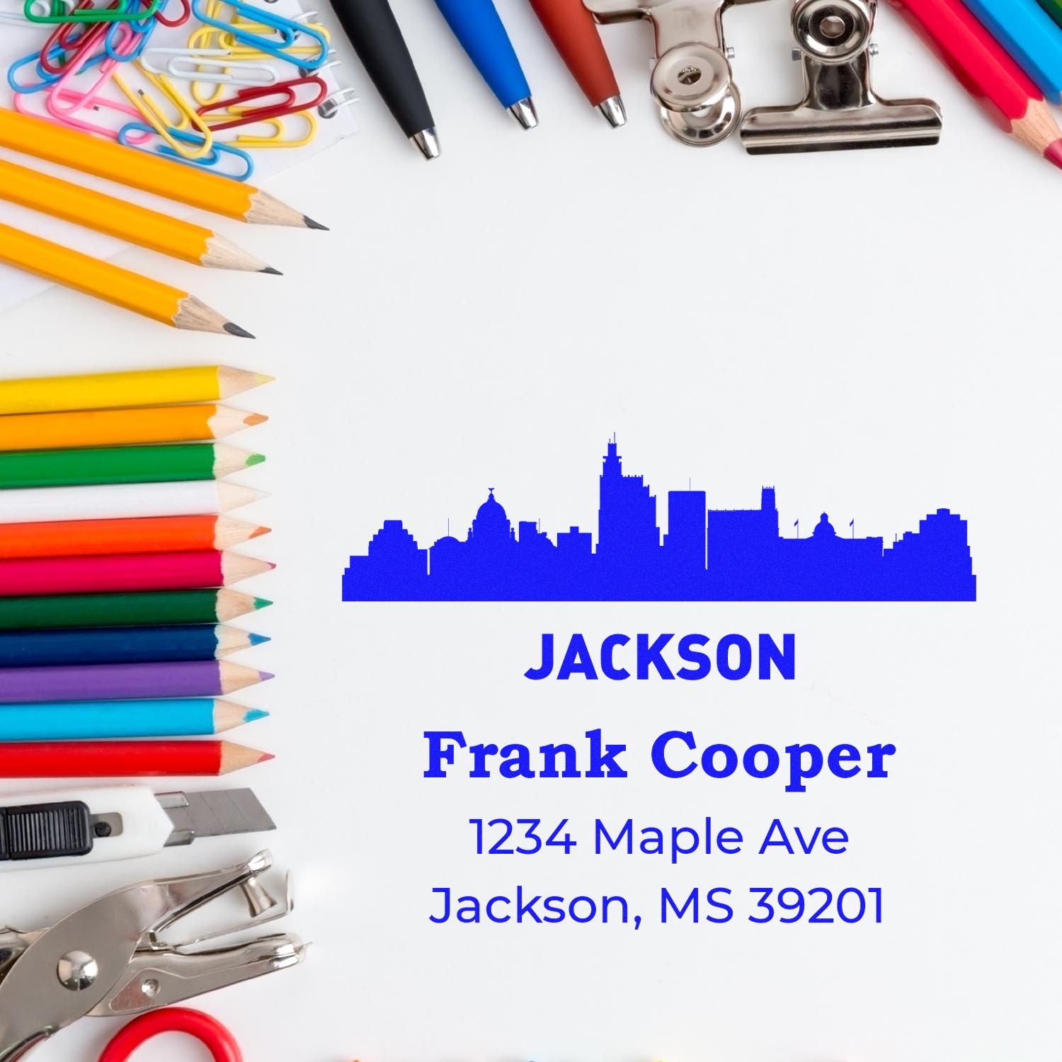 Custom return address rubber stamp with Jackson skyline for Frank Cooper, 1234 Maple Ave, Jackson, MS 39201.