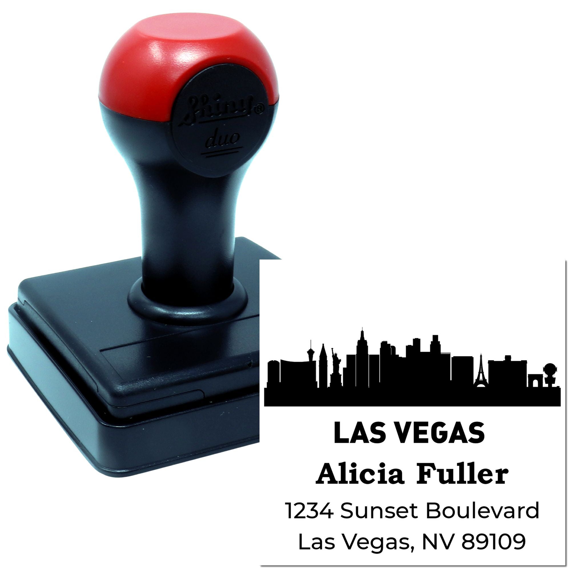 Custom self-inking rubber address stamp with Las Vegas skyline, name, and return address for personalized mailing.