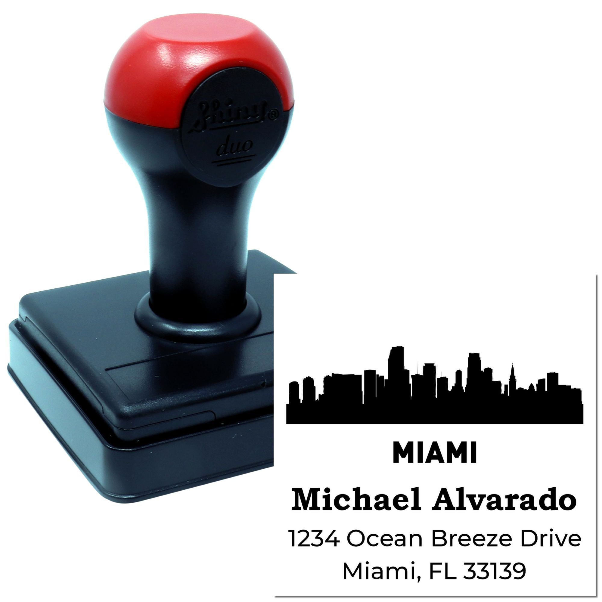 Custom self-inking address rubber stamp with Miami skyline and personalized return address for business mailings.