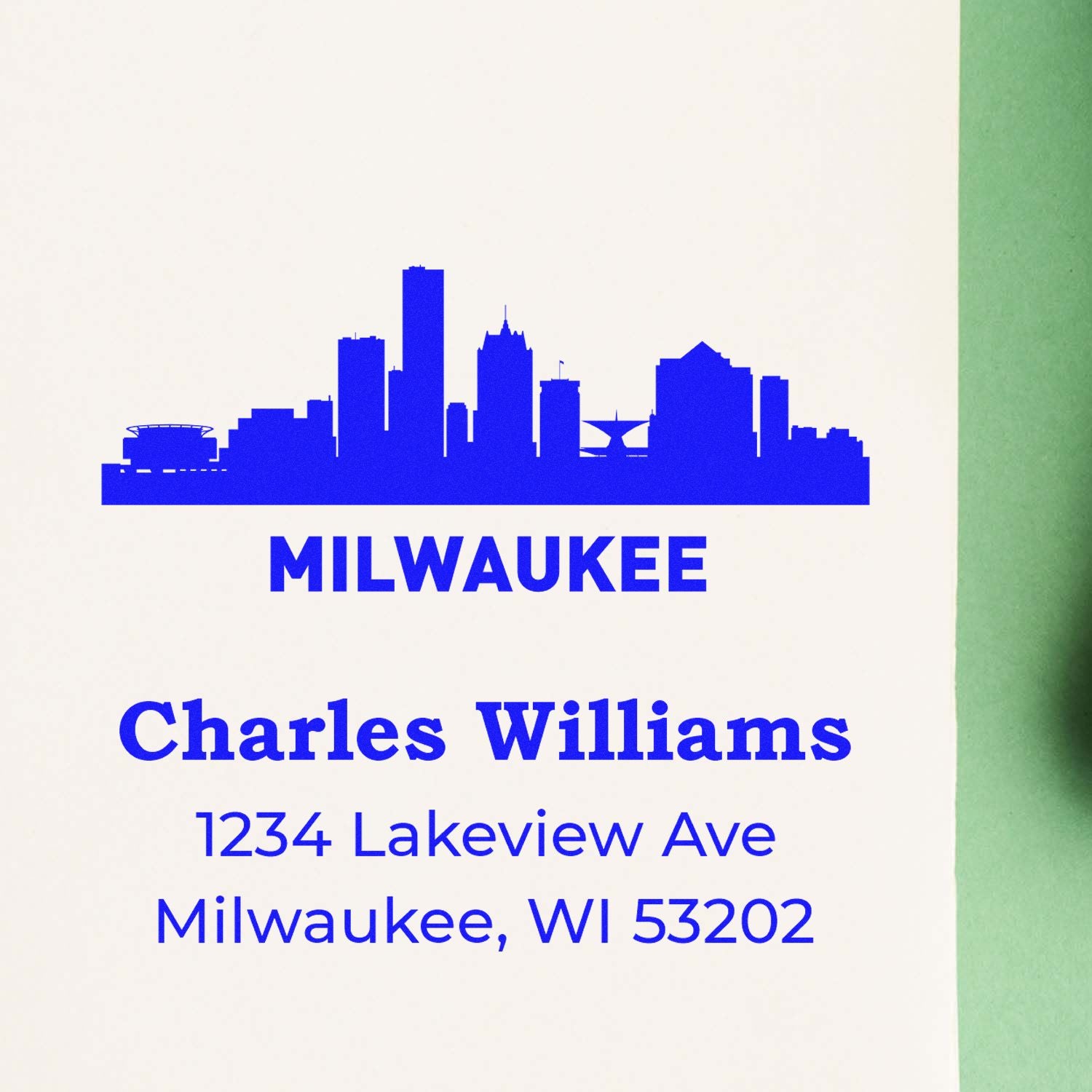 Custom Milwaukee rubber stamp with skyline graphic, Charles Williams name, and address 1234 Lakeview Ave, Milwaukee, WI 53202.
