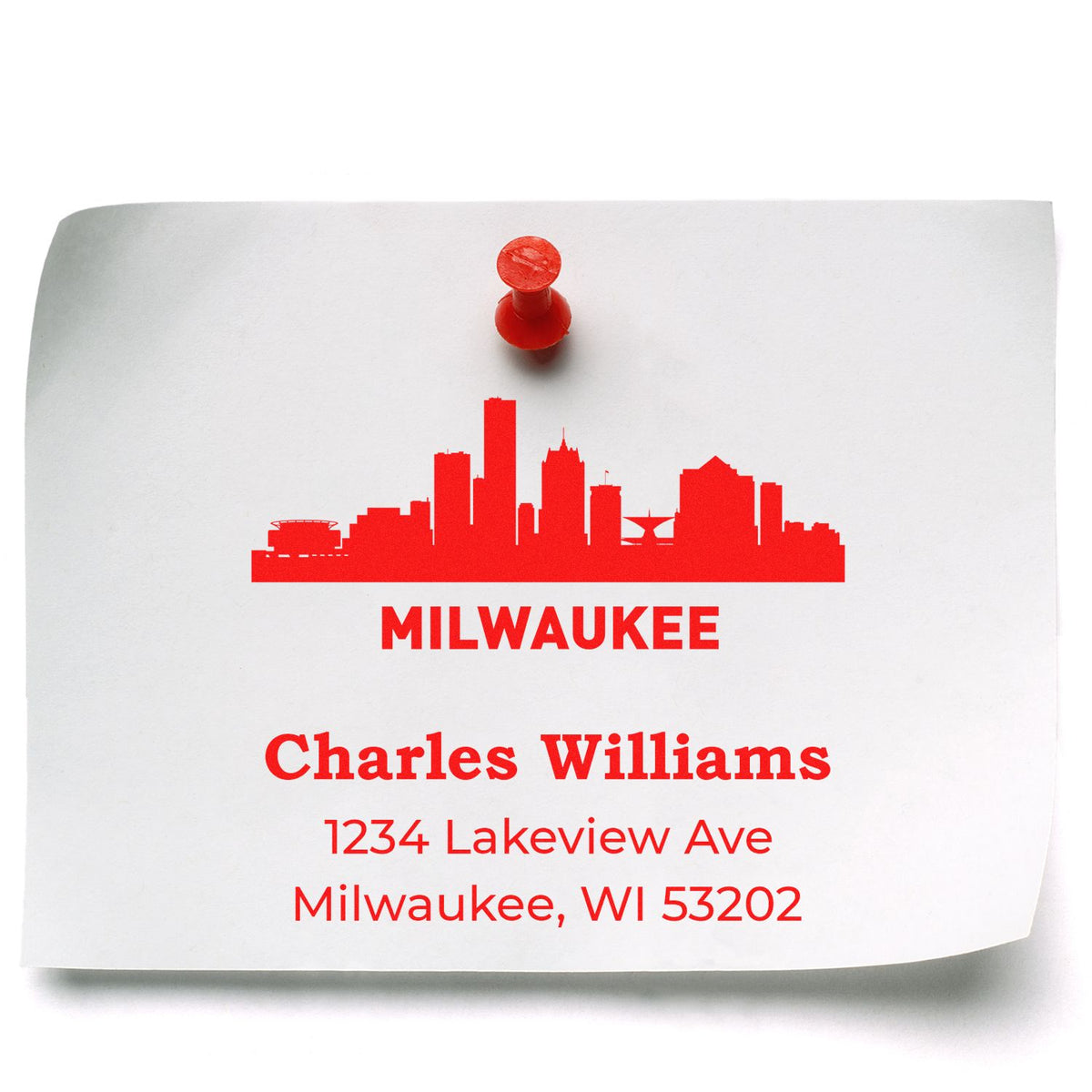 Custom Milwaukee address rubber stamp with skyline design and Charles Williams, 1234 Lakeview Ave, Milwaukee, WI 53202.
