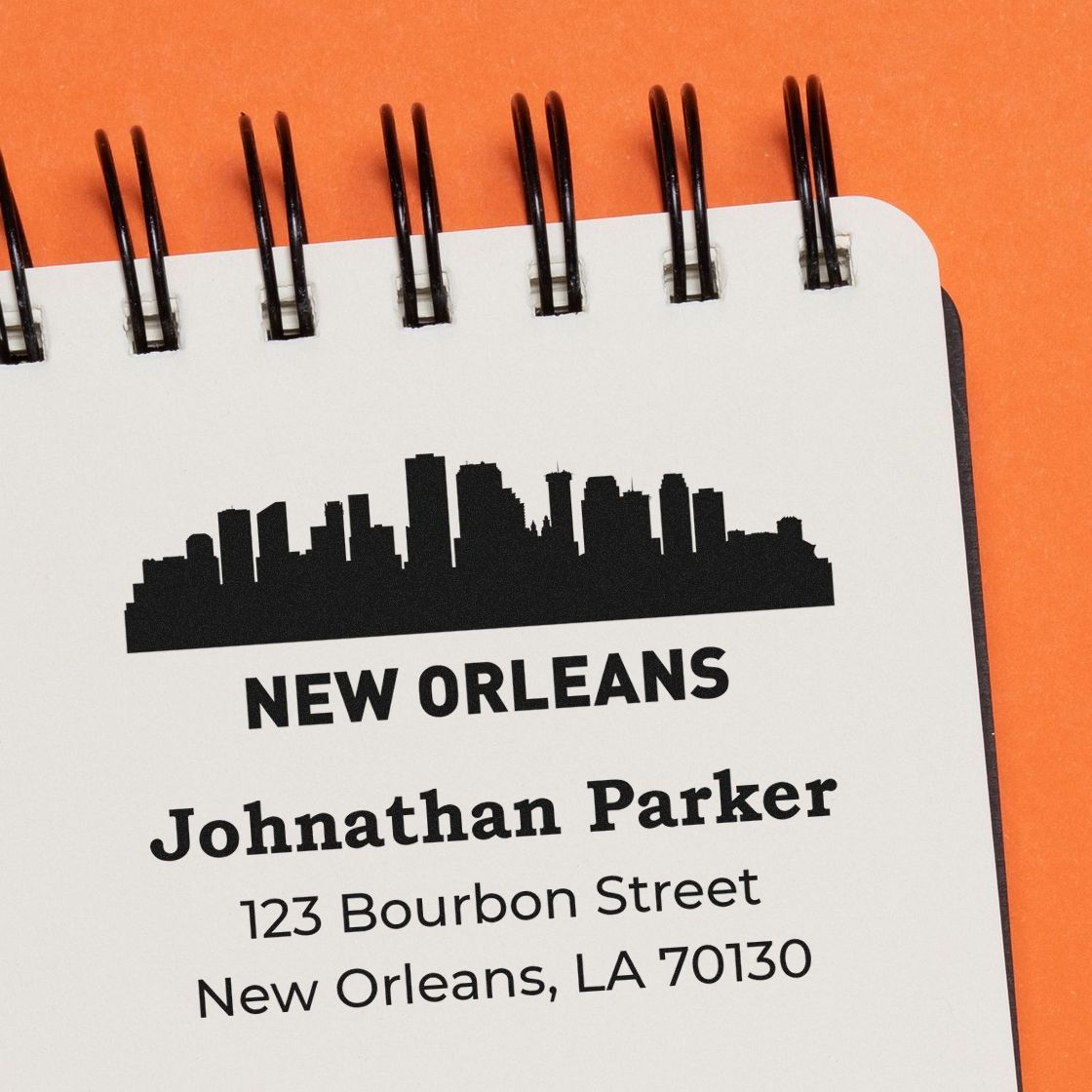 Custom New Orleans address rubber stamp featuring skyline, name, and Bourbon Street return address design.