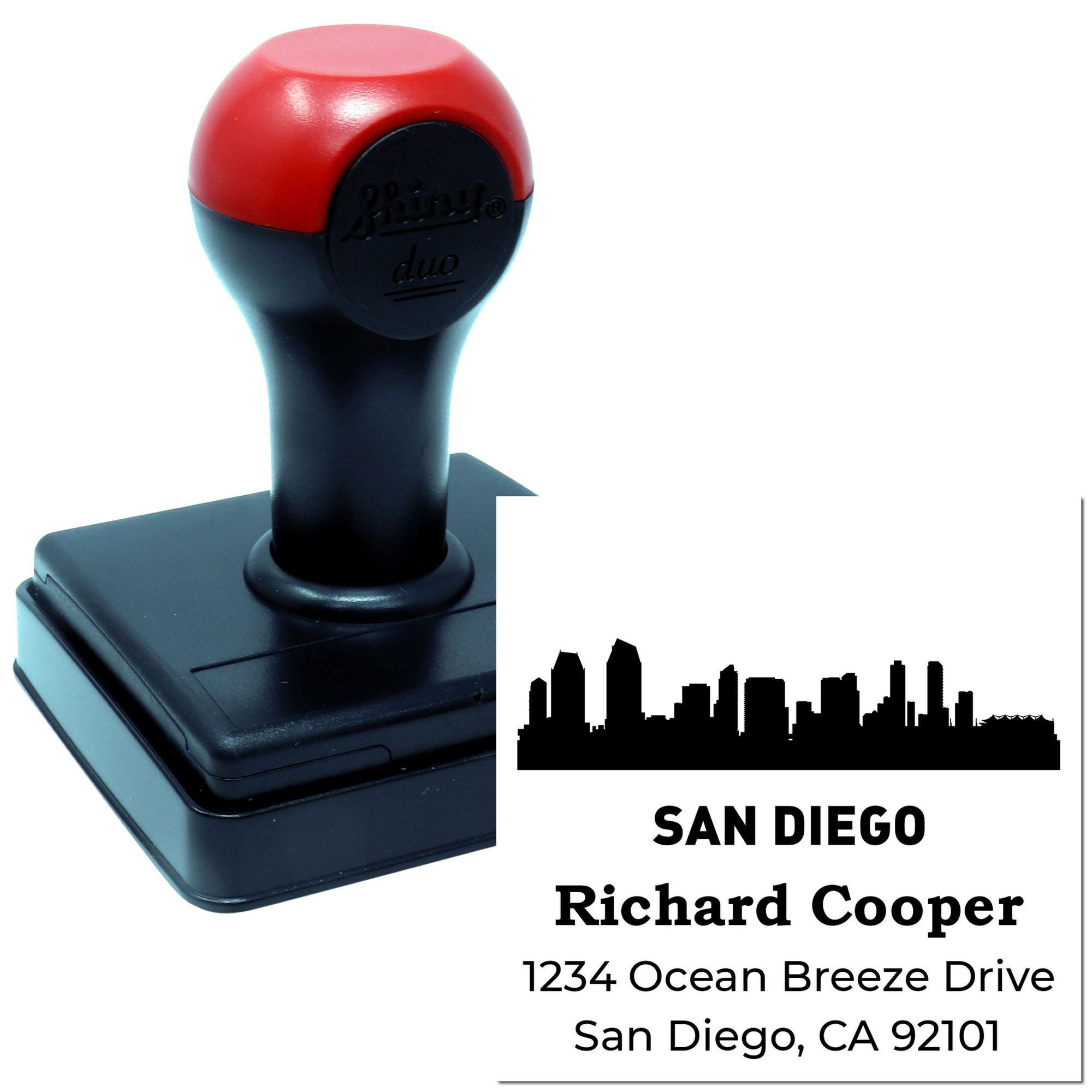 Custom self-inking rubber address stamp with San Diego skyline and personalized return address for Richard Cooper.
