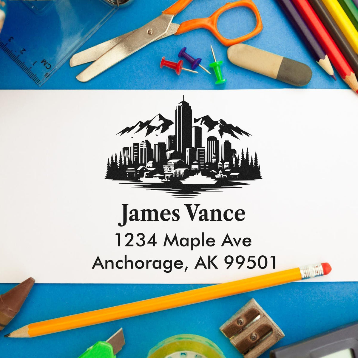 Custom rubber address stamp with skyline logo for James Vance, Anchorage AK 99501, ideal for mailing envelopes and crafts.