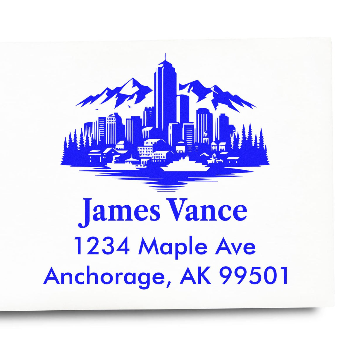 Anchorage skyline custom return address rubber stamp for James Vance, 1234 Maple Ave, Anchorage, AK 99501.