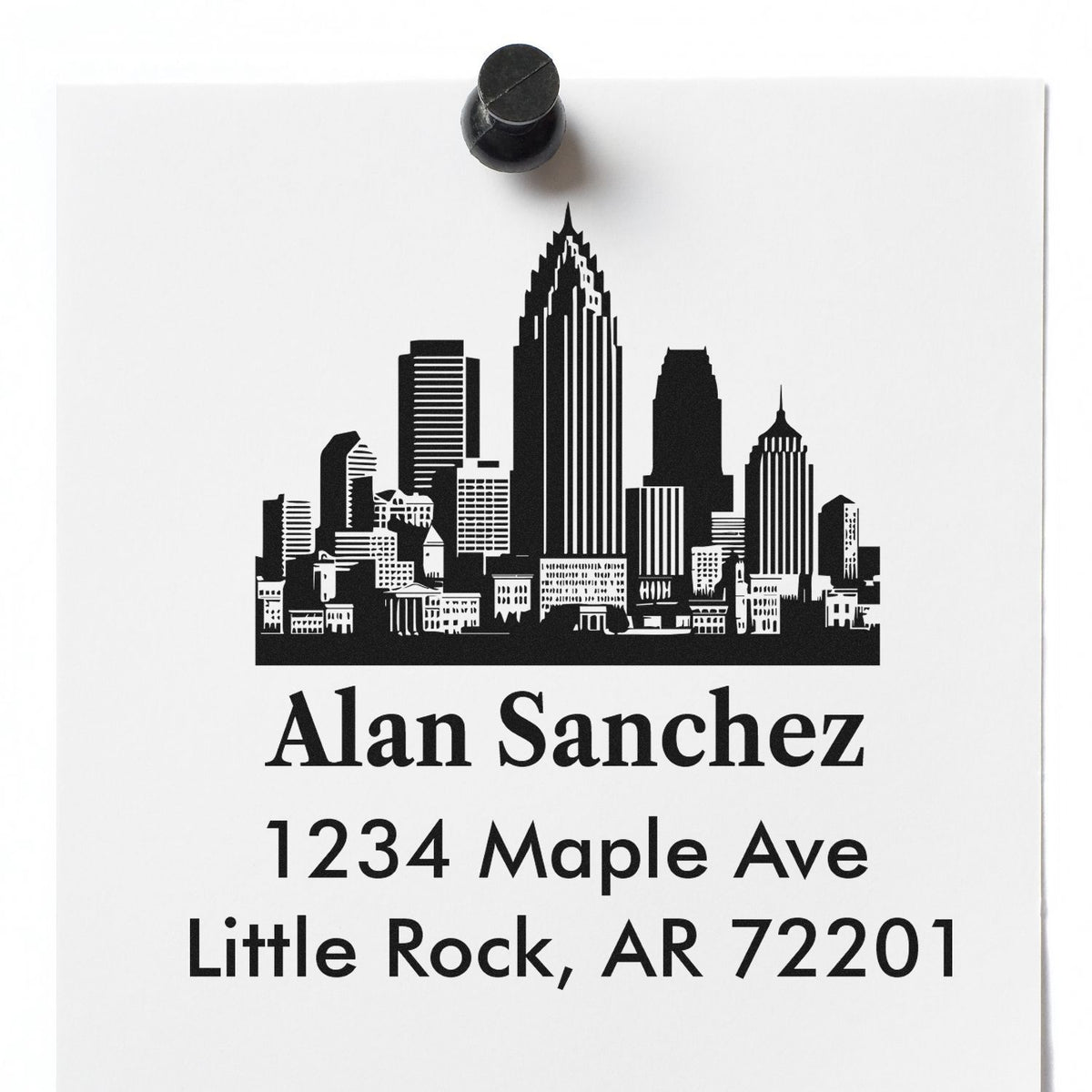 Custom address rubber stamp with city skyline design for Alan Sanchez, 1234 Maple Ave, Little Rock, AR 72201.