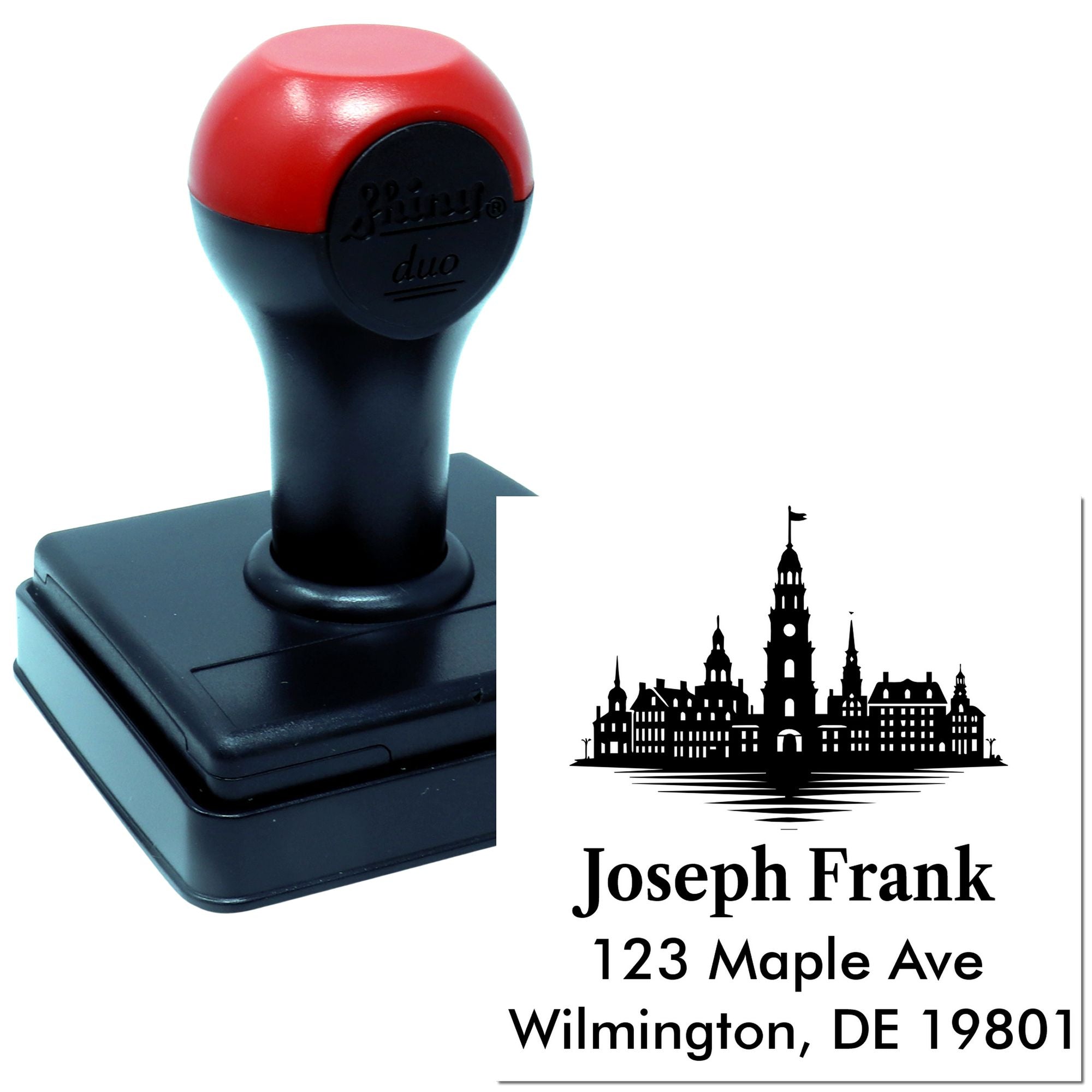 Personalized self-inking rubber stamp with custom name, address and skyline design for business or mailing use.