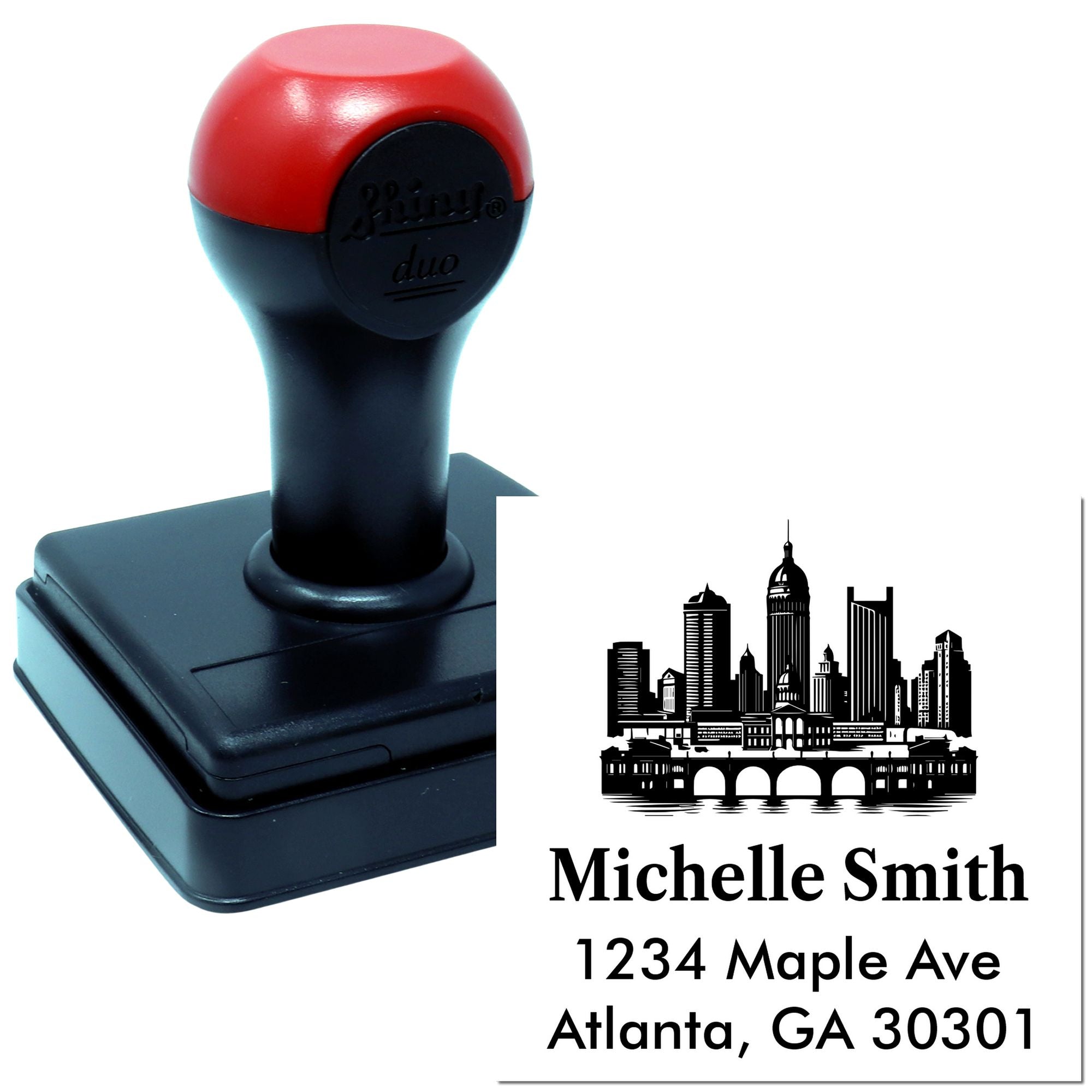 Custom self-inking rubber address stamp with Atlanta skyline design for Michelle Smith, 1234 Maple Ave, Atlanta, GA 30301