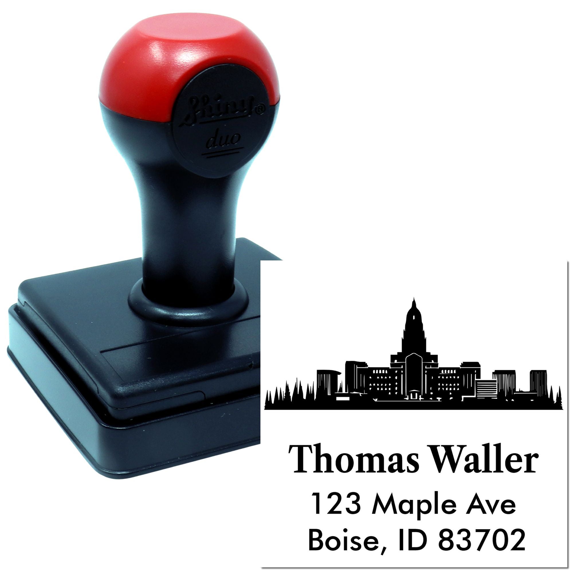 Custom self-inking address rubber stamp with skyline logo and Thomas Waller return address imprint, Boise, ID.